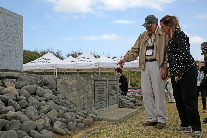 U.S. Army veteran Edward Mervich, left, tells Anne Swenson about his experiences fighting in the Battle of Iwo Jima March 19 during the annual Reunion of Honor ceremony. This year's ceremony commemorated the 69th anniversary of the battle on Iwo To, formerly known as Iwo Jima, Japan. On the ground where one of the most brutal battles of World War II took place, Japanese and U.S. allies came together to honor and remember the sacrifices of the gallant men who fought for their countries more than 69 years ago.