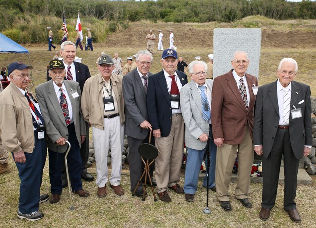 Eight U.S. veterans who fought in the Battle of Iwo Jima pose for a photo March 19 during the annual Reunion of Honor ceremony. This year's ceremony commemorated the 69th anniversary of the battle on Iwo To, formerly known as Iwo Jima, Japan. "My hope is that both sides will continue to support and join the annual Joint Reunion of Honor," said retired Lt. Gen. Lawrence F. Snowden, "so that the families of those who served here will have the opportunity to honor their loved ones for their service to their nations and the opportunity to express their continuing love to those who paid the supreme price of giving their lives here." (U.S. Marine Corps photo by Cpl. Jose D. Lujano/Released)