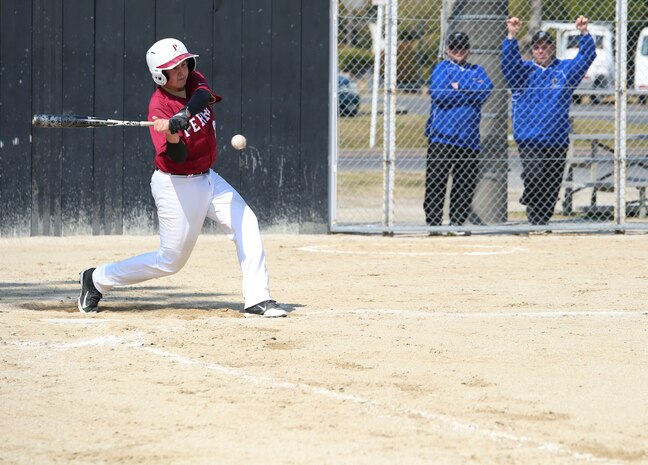 Austin Macias, a Matthew C. Perry High School Samurai baseball team member, swings a baseball bat during a game that took place aboard Marine Corps Air Station Iwakuni, Japan, March 15, 2014.Being a part of a sports team gives students a chance to explore different parts of the pacific region.