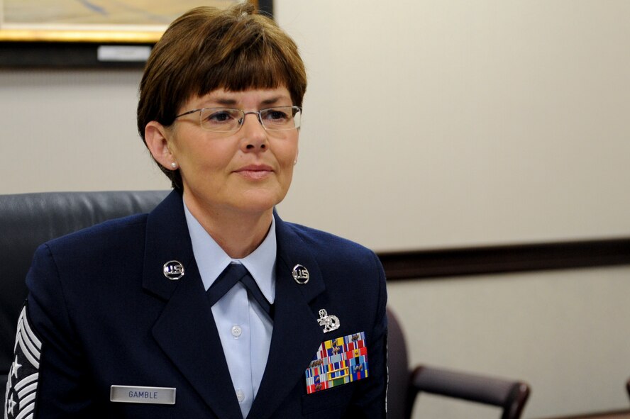 Chief Master Sgt. Victoria Gamble, Air Mobility Command's command chief, listens to an Airman recite the Airman’s Creed during a board March 17, 2014 at Scott Air Force Base, Ill. Gamble led a board for AMC Airmen who are eligible for an Air Force level award. (U.S. Air Force photo/Senior Airman Sarah Hall-Kirchner)