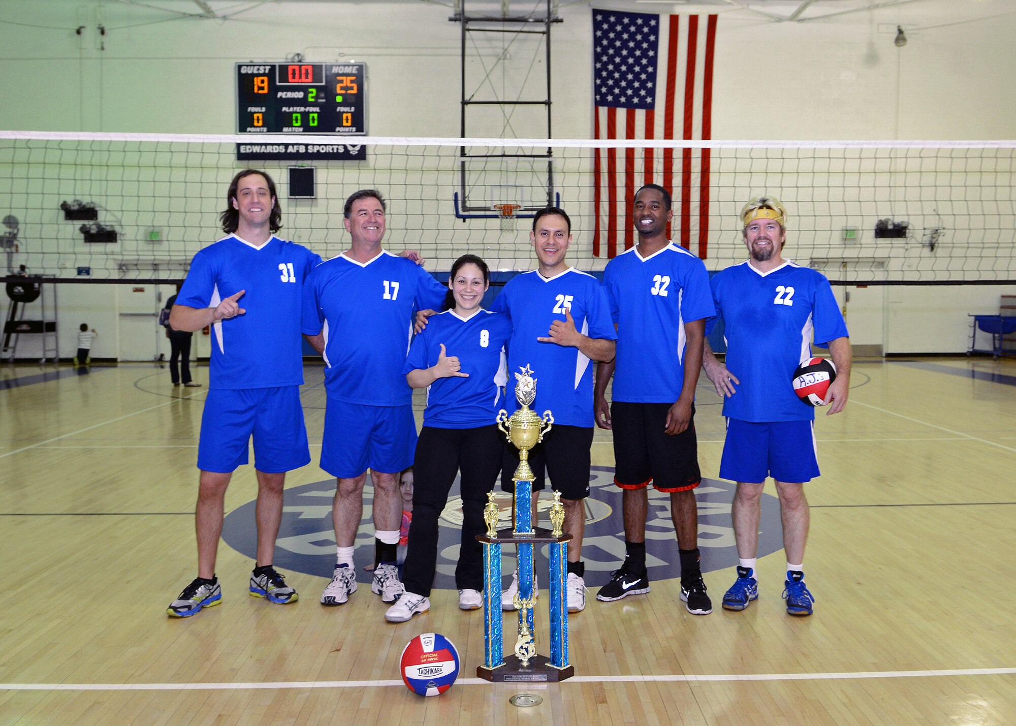 The 412th Test Engineering Group team poses for a team photo after battling through two matches to defeat the Air Force Research Laboratory Detachment 7 team for the 2014 Base Intramural Volleyball Championship on Mar. 13 at the Rosburg Fitness Center. (Courtesy photo by Pamela Walker)
