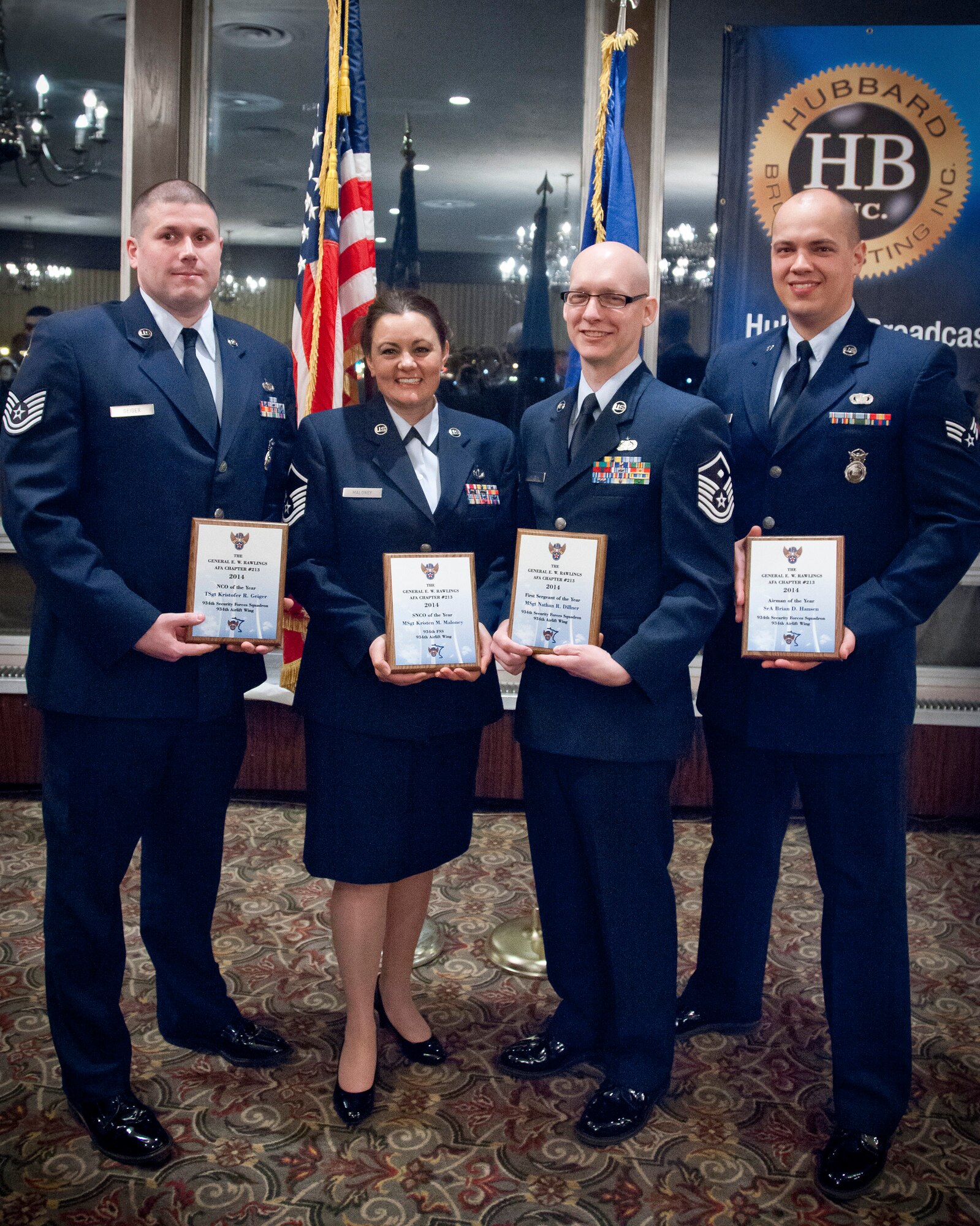 (From left to right) Tech. Sgt. Kristofer Geiger, Master Sgt. Kristen Maloney, Master Sgt. Nathan Dillner, and Senior Airman Brian Hansen are recognized by the Air Force Association's General E.W. Rawlings Chapter as the Airman of the Year awardees (Not pictured is Capt. Ethan Bryant).  The AFA honored awardees from the 934th Airlift Wing, Air National Guard, Reserve Officer Training Corp, the Junior ROTC, and the Rawlings Chapter Teacher of the Year at their annual awards dinner March 15 at the Town and Country Club, St. Paul, Minn.  (U.S. Air Force photo by Shannon McKay/Released)