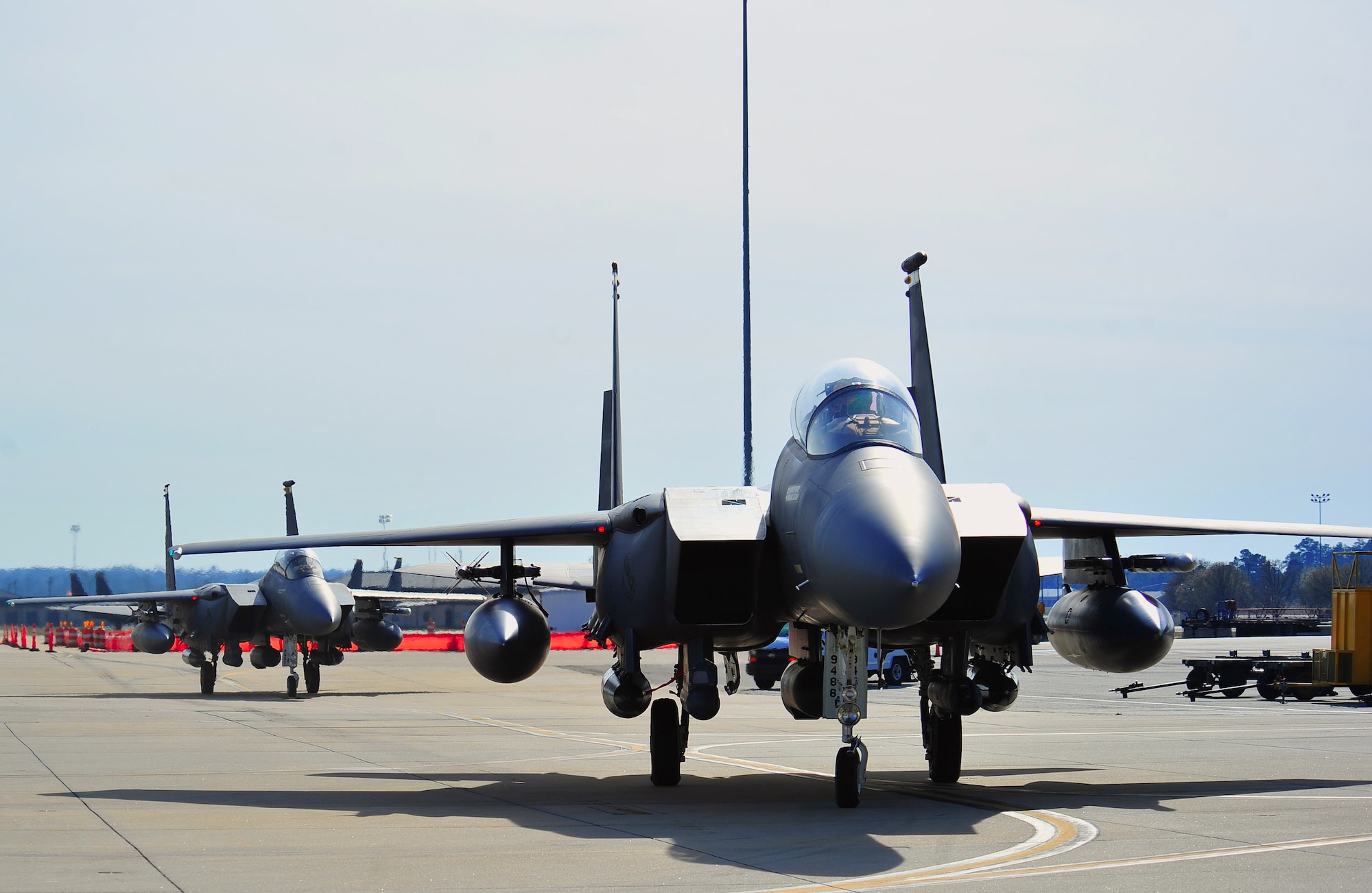 F-15E Strike Eagle aircraft, assigned to the 336th Fighter Squadron, return from Red Flag 14-2, March 15, 2014, at Seymour Johnson Air Force Base, N.C. Red Flag is a two-week long combat training exercise that incorporates all spectrums of warfare, including command and control, real-time intelligence, analysis and exploitation and electronic warfare. (U.S. Air Force photo/Airman 1st Class Shawna L. Keyes)