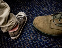 A student from St. Andrews Elementary School and an Airman from Joint Base Charleston, S.C., eat breakfast before the Airmen read to the children March 7, 2014. More than 30 Airmen from JB Charleston attended the annual reading event, ate breakfast with the children, answered questions about the Air Force and then read the children’s favorite Dr. Seuss book.  (U.S. Air Force photo/ Senior Airman Dennis Sloan)