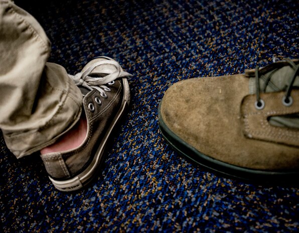 A student from St. Andrews Elementary School and an Airman from Joint Base Charleston, S.C., eat breakfast before the Airmen read to the children March 7, 2014. More than 30 Airmen from JB Charleston attended the annual reading event, ate breakfast with the children, answered questions about the Air Force and then read the children’s favorite Dr. Seuss book.  (U.S. Air Force photo/ Senior Airman Dennis Sloan)