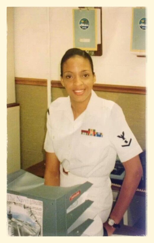 U.S. Navy Petty Officer Third Class Twanna Burke works in her section August 1997, at Naval Air Station Sigonella, Italy. During Burke’s 20 year career, she spent a total of nine months deployed to Sigonella, Italy where she first met her husband, retired U.S. Navy Petty Officer 1st Class James Edwards Sr.  (Courtesy photo)