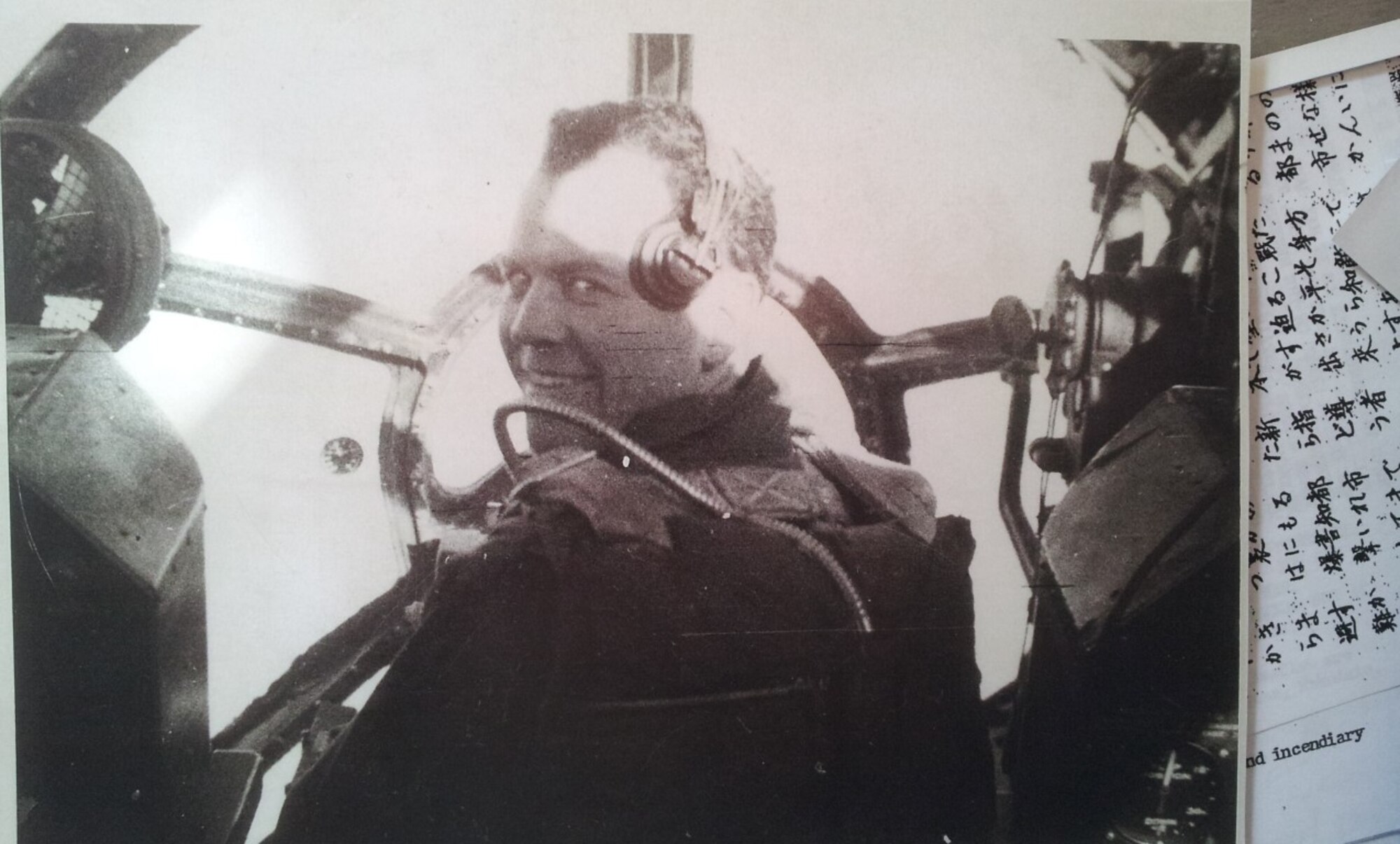 Former U.S. Air Force 1st Lt. Ken Taylor, World War II B-29 bombardier, smiles for a picture while sitting in his B-29. Taylor flew 30 missions over Japan between April and August of 1945, earning a Distinguished Flying Cross and flying the last combat mission during WWII. (Courtesy Photo)