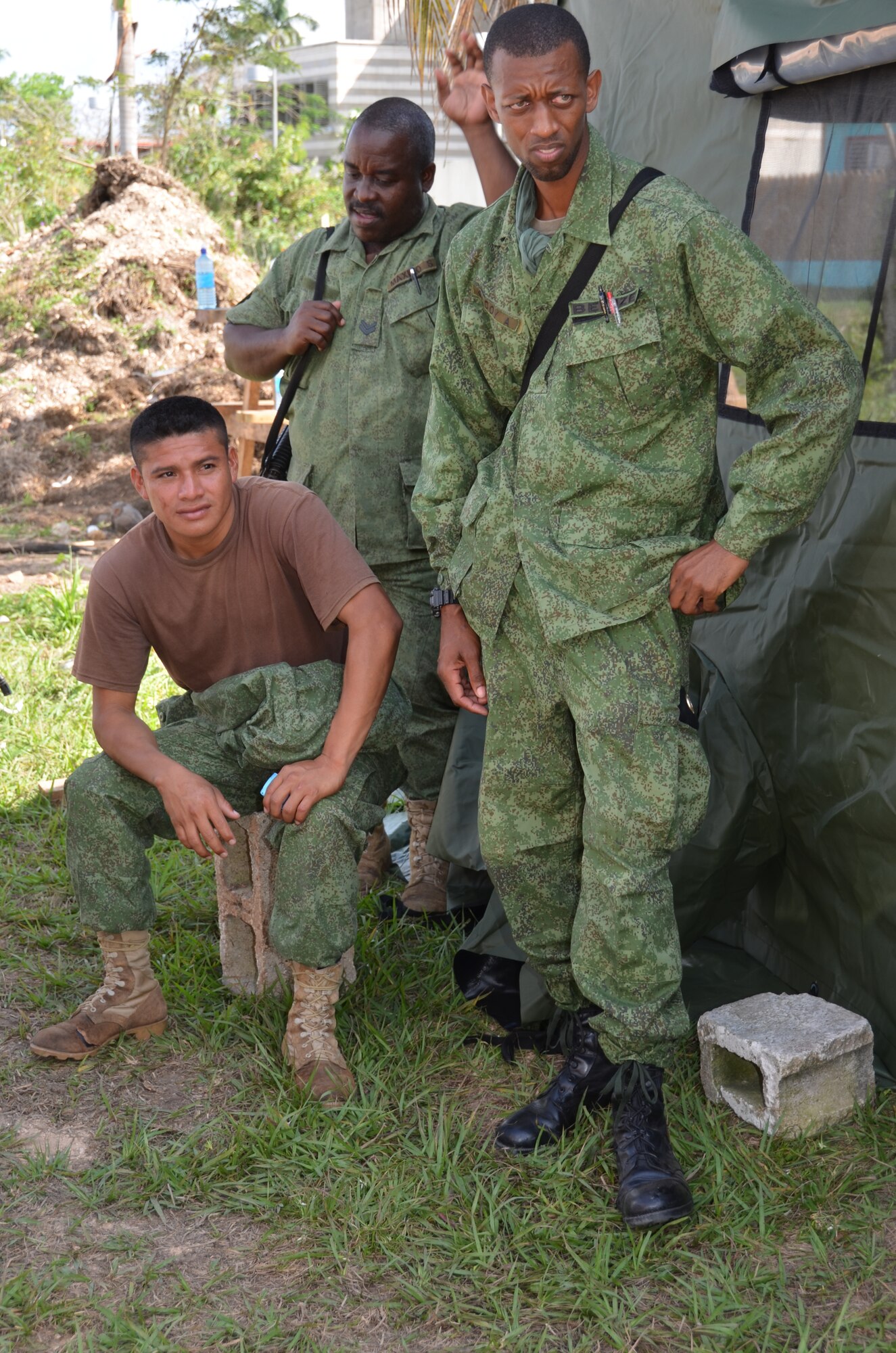 Belize Defence Force soldiers secure New Horizons equipment at the Belmopan Hospital construction site, March 11. During the past 20 years, U.S. Southern Command has worked side-by-side with the Belize Defence Force as well as the Ministries of Health and Education to conduct combined exercises to strengthen each participant's response to humanitarian relief scenarios. (USAF photo by Master Sgt. Kelly Ogden/Released)