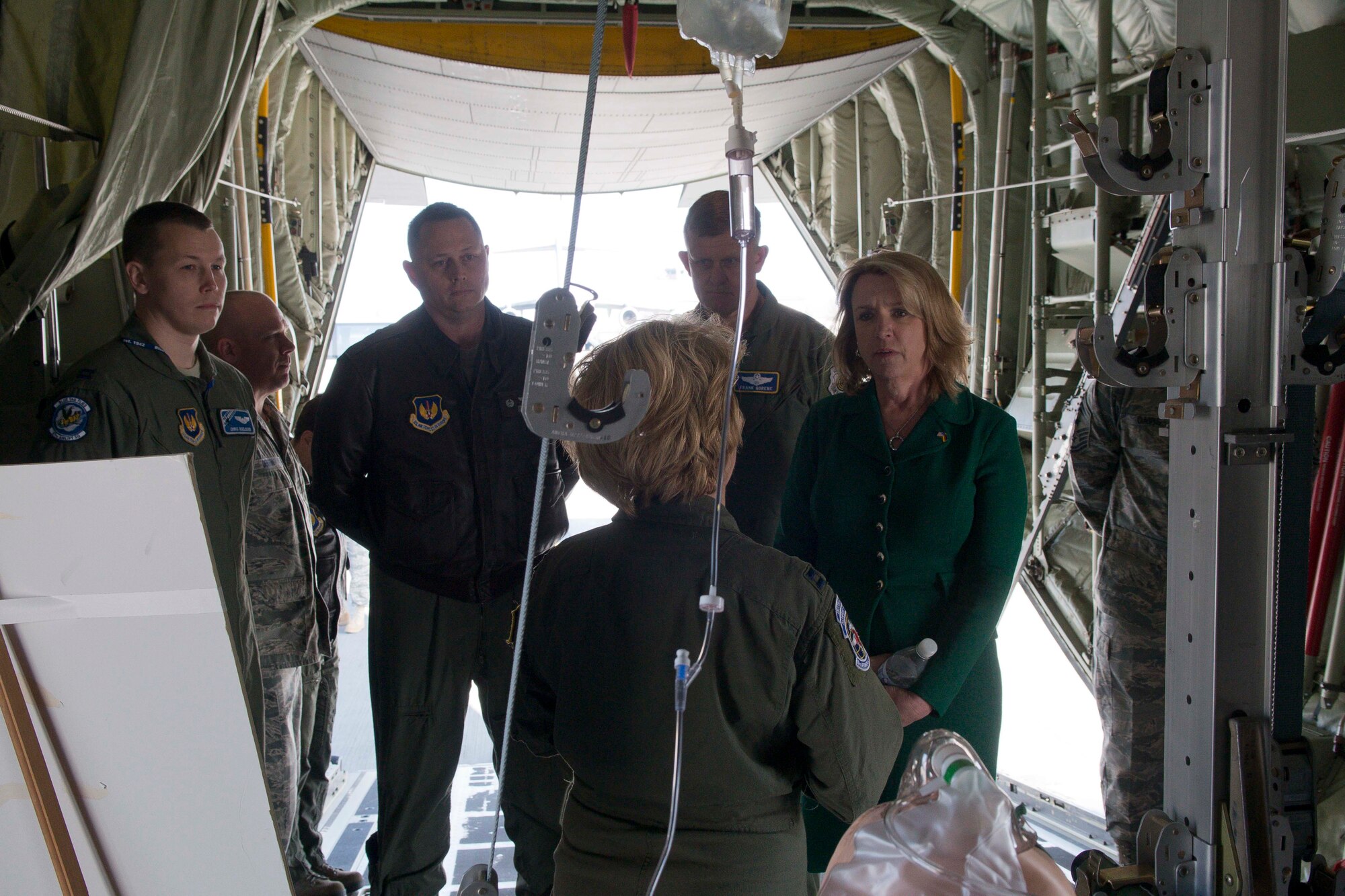 Secretary of the Air Force Deborah Lee James discuss capabilities with 86th Aeromedical Evacuation Squadron personnel during a tour of a C-130J Super Hercules March 17, 2014, Ramstein Air Base, Germany. During James' first visit to Europe as SecAF, she visited with Airmen in their workplaces and received briefings on Ramstein’s many missions. (U.S. Air Force photo/Senior Airman Jose L. Leon)