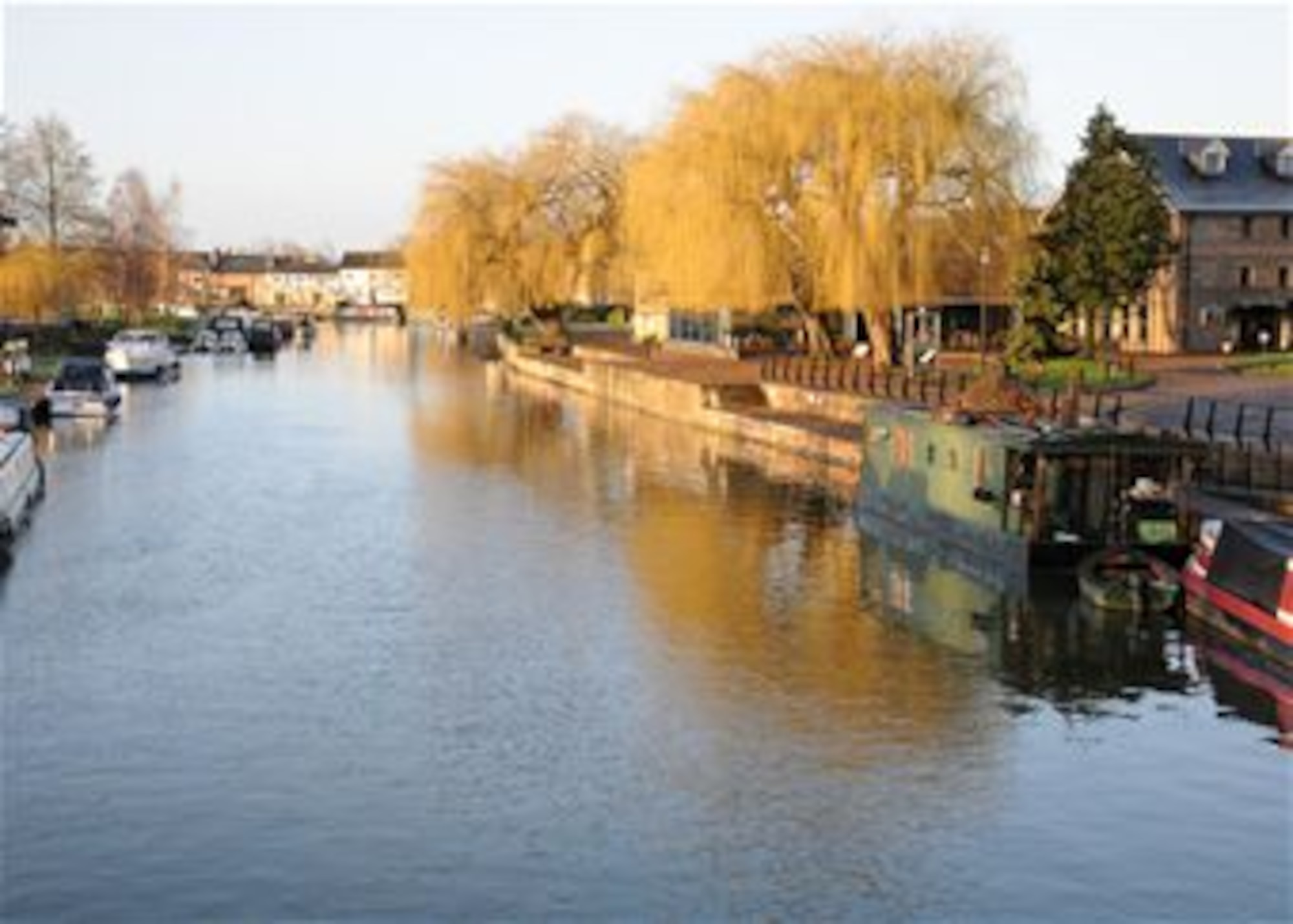 Boats are ready for visitors to hire Feb. 26, 2014, in Ely, England. The Great River Ouse passes through the city. It originates in central England, and it flows into East Anglia before it enters the Wash on the north-Norfolk coast. The best way to see Ely and its surroundings is to hire a boat and enjoy the freedom of the open waterways. A more leisurely way to explore the Great River Ouse is to relax with a boat trip in a chauffeur-driven boat. (U.S. Air Force photo by Gina Randall/Released)