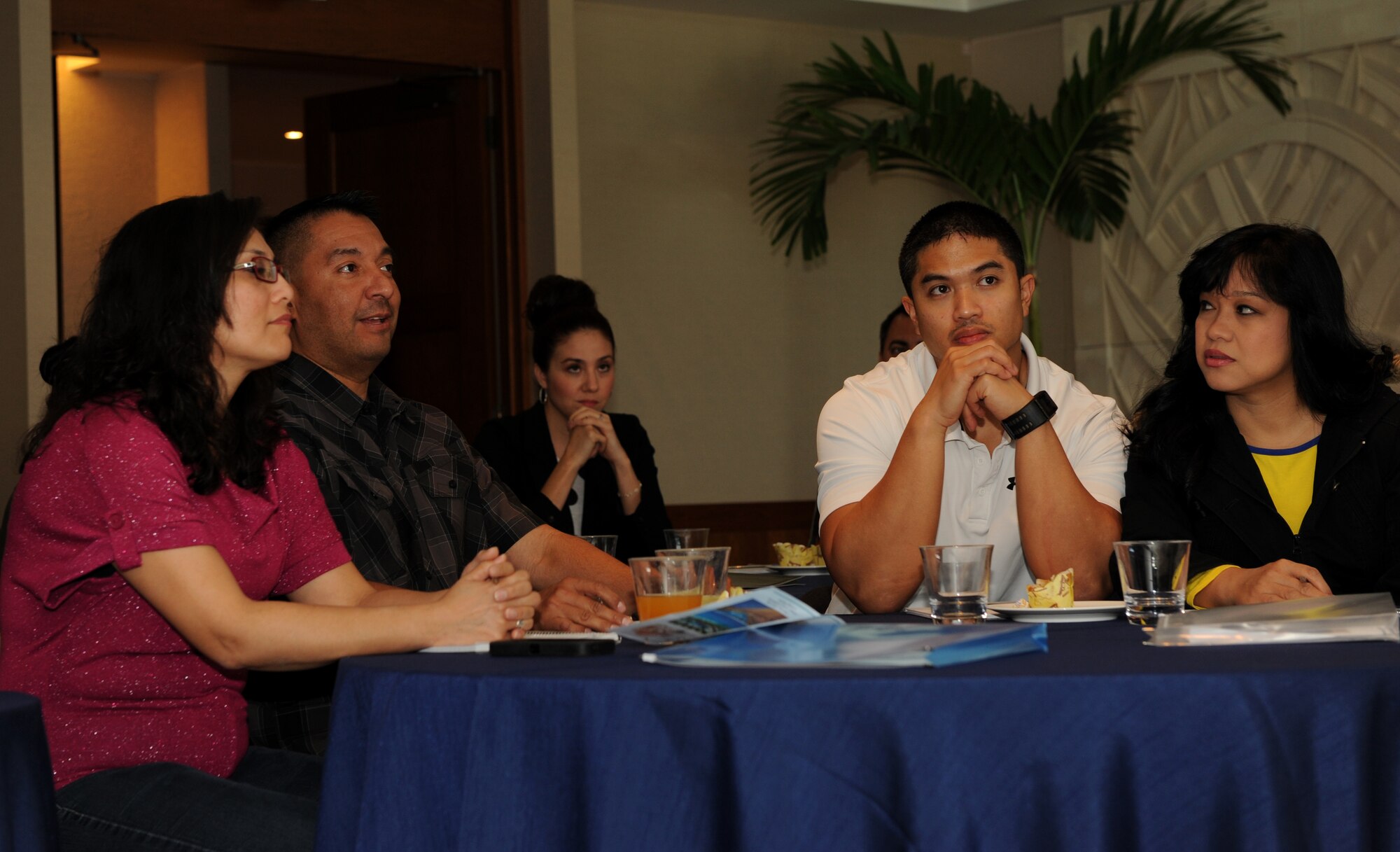U.S. Air Force Master Sgt. David Alvarado, 18th Operations Group branch superintendent of 18th Aeromedical Evacuation, answers a question at the marriage retreat at the Kafuu Resort on Okinawa, Japan, March 15, 2014. The Kafuu Resort was the getaway location for approximately 14 couples for a chapel-sanctioned marriage retreat, which focused on couples communication and the roles each member plays in their marriage. (U.S. Air Force photo by Airman 1st Class Hailey R. Staker)