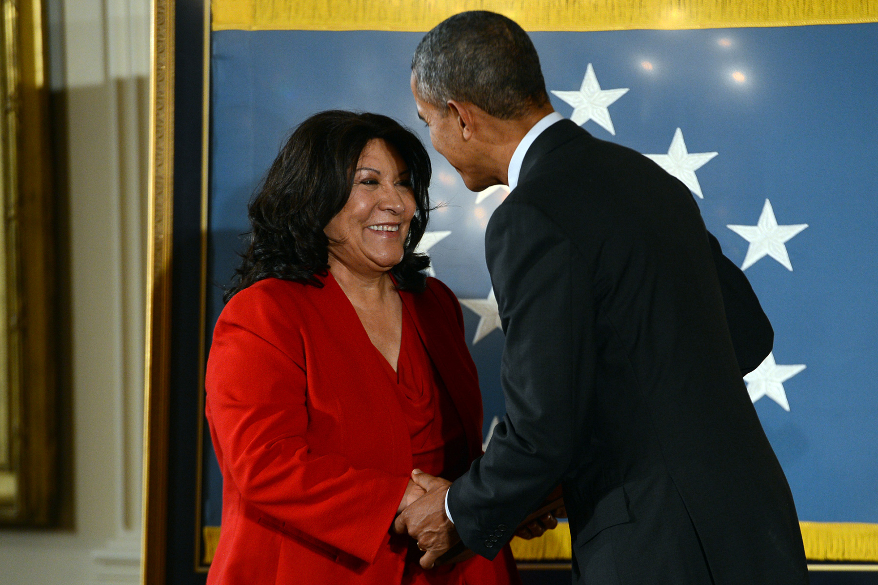 Miriam Adams accepts the Medal of Honor on behalf of her late uncle, Army  Pvt. Joe