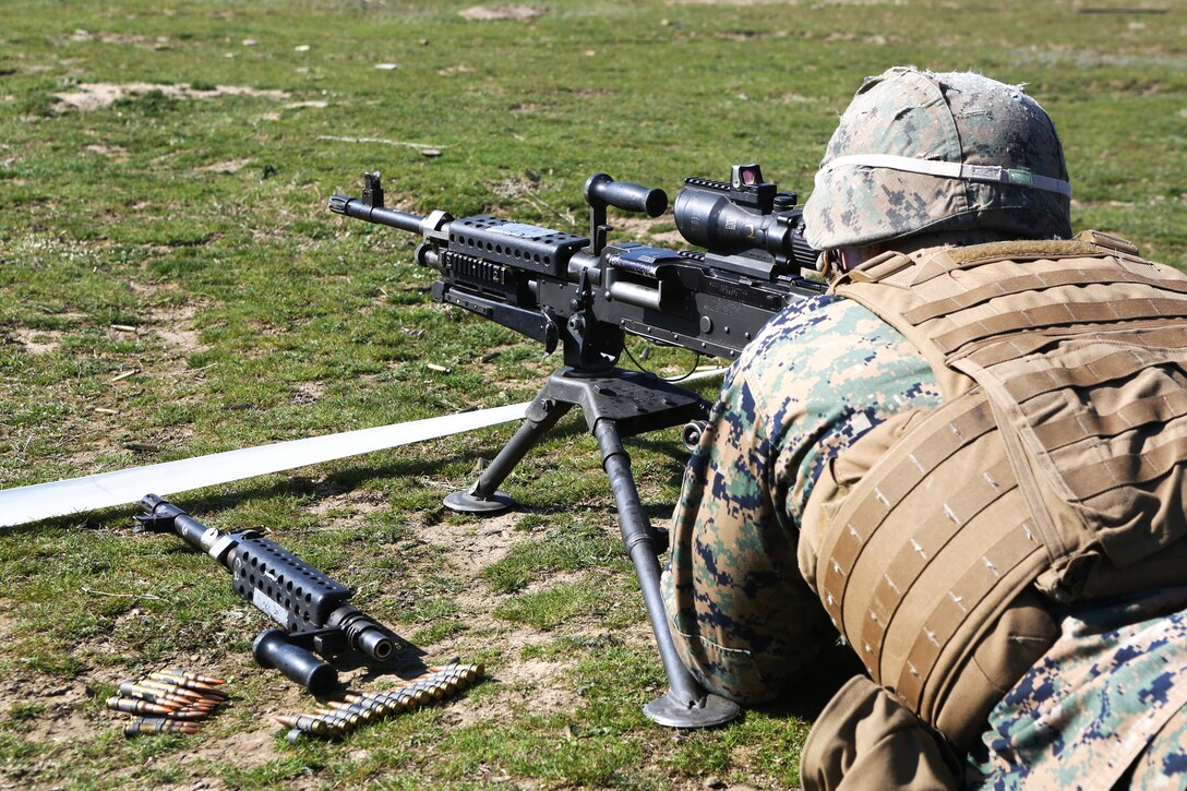 MIHAIL KOGALNICEANU, Romania - Lance Cpl. Joshua Camaiani, a Marine with Weapons Company, 3rd Battalion, 8th Marines, assigned to Black Sea Rotational Force 14, battle sight zeros an M240B machine gun while he participates in routine weapons exercises at Mihail Kogalniceanu, Romania, March 14, 2014. BSRF-14 is a contingent of Marines and sailors in the Black Sea, Balkans and Caucasus regions that work with partner nations to maintain proven partnerships while building military capacity, promoting regional stability, and providing the capability for rapid crisis response throughout Eastern Europe as directed by U.S. Marine Corps Forces Europe and Africa, U.S. European Command.