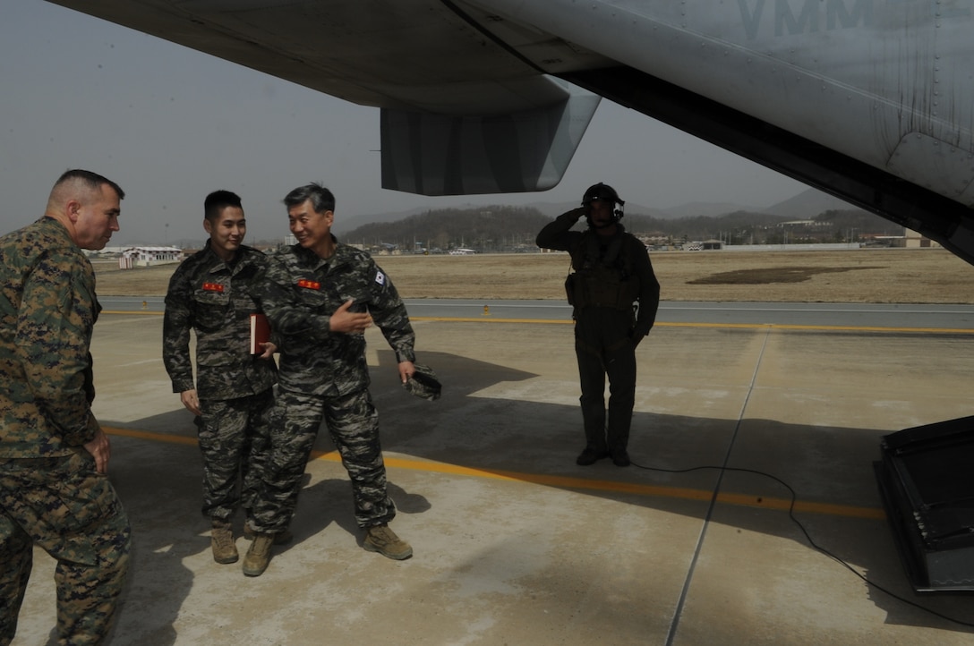 U.S. Marine Lt. Gen. John Wissler, left, and Republic of Korea Marine Lt. Gen. Ho Yeon Lee board an MV-22B Osprey tiltrotor aircraft at Daegu Air Base in Daegu, Republic of Korea. Wissler and Hyun linked up at Daegu to observe the 3rd Marine Division’s combined operations center during the command post exercise portion of Marine Expeditionary Force Exercise 2014. MEFEX enhances the interoperability between the U.S. Marine air-ground task force and the ROK Marine task force while honing amphibious capabilities of each nation’s Navy and Marine Corps. Wissler is the commanding general of III Marine Expeditionary Force, and Lee is the commandant of the ROK Marine Corps. The Osprey and crew are with Marine Medium Tiltrotor Squadron 262, Marine Aircraft Group 36, 1st Marine Aircraft Wing, III MEF.
