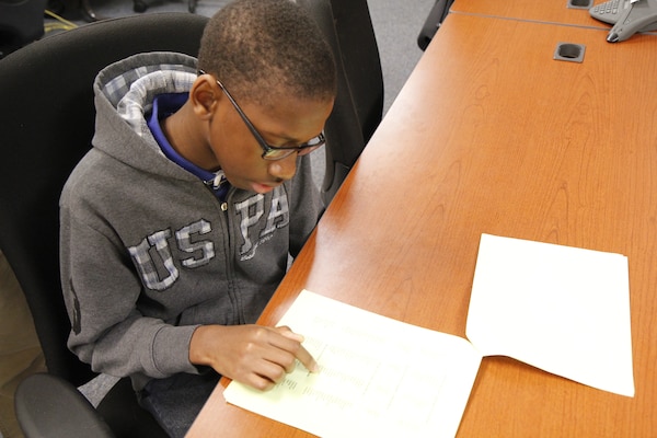 Joseph Ebai, the son of a Charleston District economist in the planning branch, won the Berkeley County Spelling Bee.