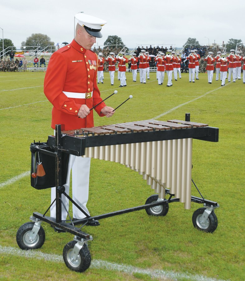 A Marine Drum and Bugle Corps xylophone player entertains onlookers during “Music In Motion” at Monday’s Battle Colors Ceremony held at Schmid Field, aboard Marine Corps Logistics Base Albany.