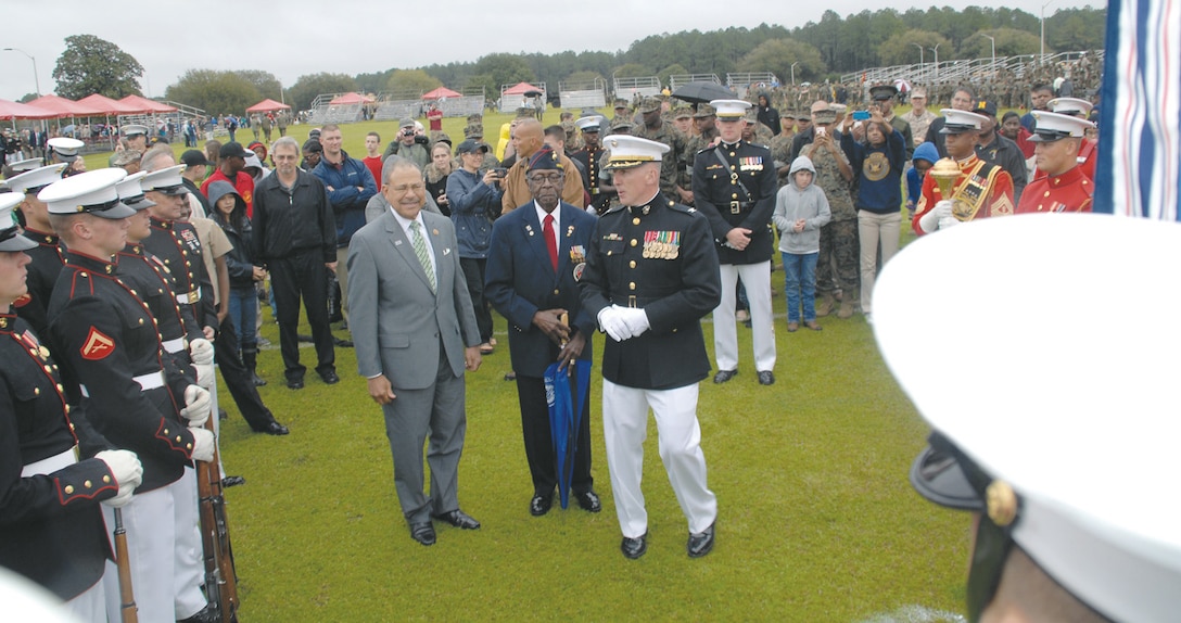 Marine Corps Logistics Base Albany’s Commanding Officer Col. Don Davis (right), Montford Point Marine Henry Jackson (center) and Congressman Sanford D. Bishop Jr., who represents the 2nd Congressional District in Georgia, thank members of the Battle Colors Detachment after the ceremony March 17.