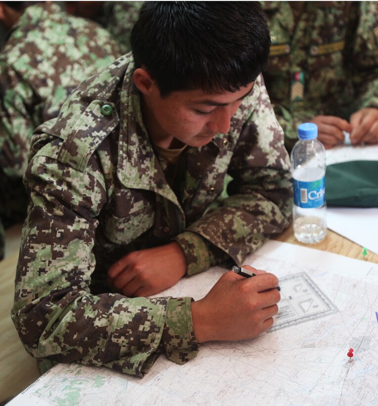 Soldiers with 4th Brigade, 215th Corps, Afghan National Army, practice plotting grid coordinates on a map during an explosive ordnance disposal course aboard Forward Operating Base Delaram II, Afghanistan, March 15, 2014. The course is designed to instill basic tactics, techniques and procedures for locating, avoiding and disposing of improvised explosive devices.