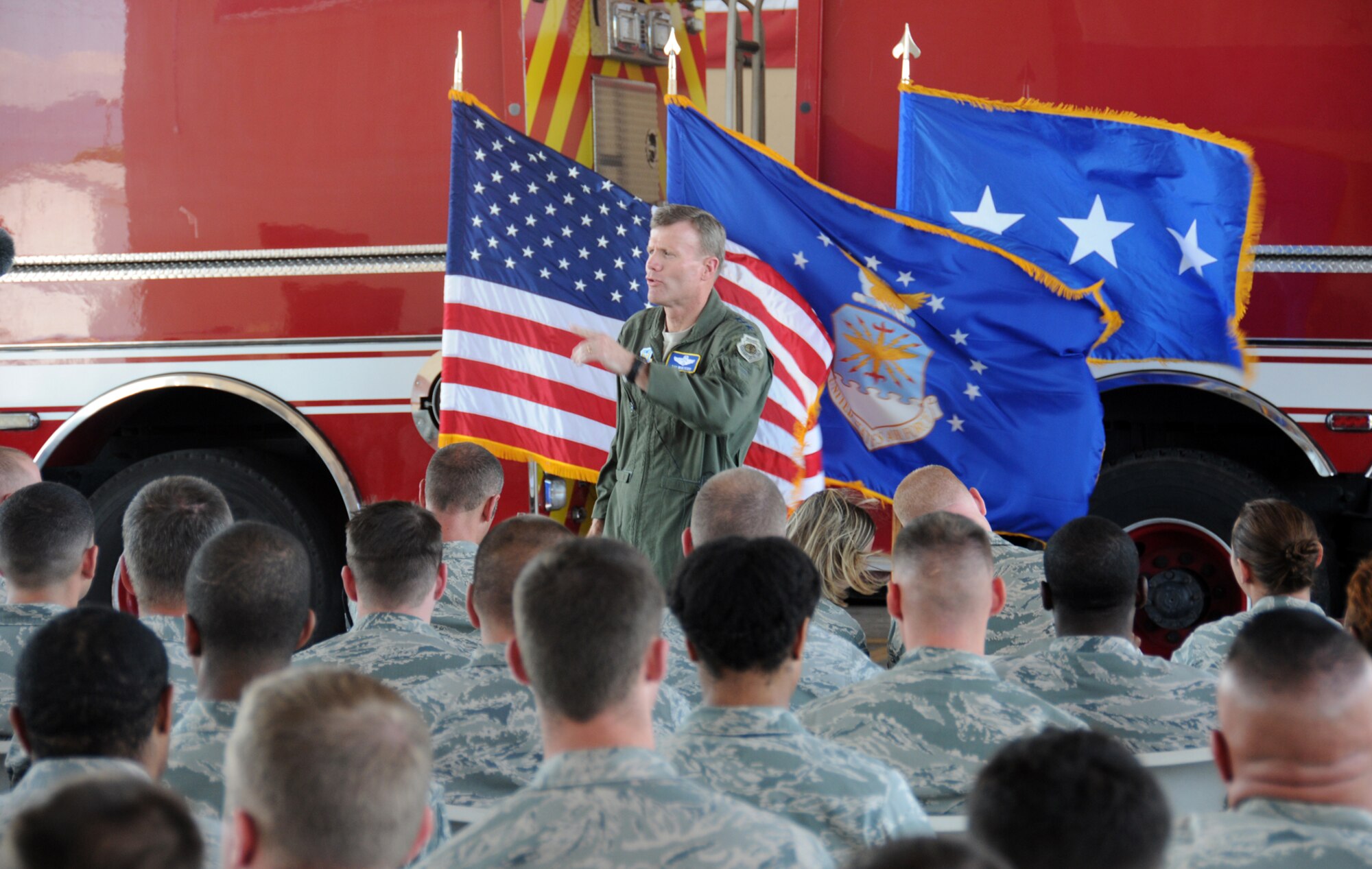 U. S. Air Force Lt. Gen. Tod Wolters, 12th Air Force commander, speaks to the all call group about his operational styles of trust, training and teamwork in the fire station at Soto Cano Air Base, Honduras March 20, 2014.  (Photo by U. S. Air National Guard Capt. Steven Stubbs)