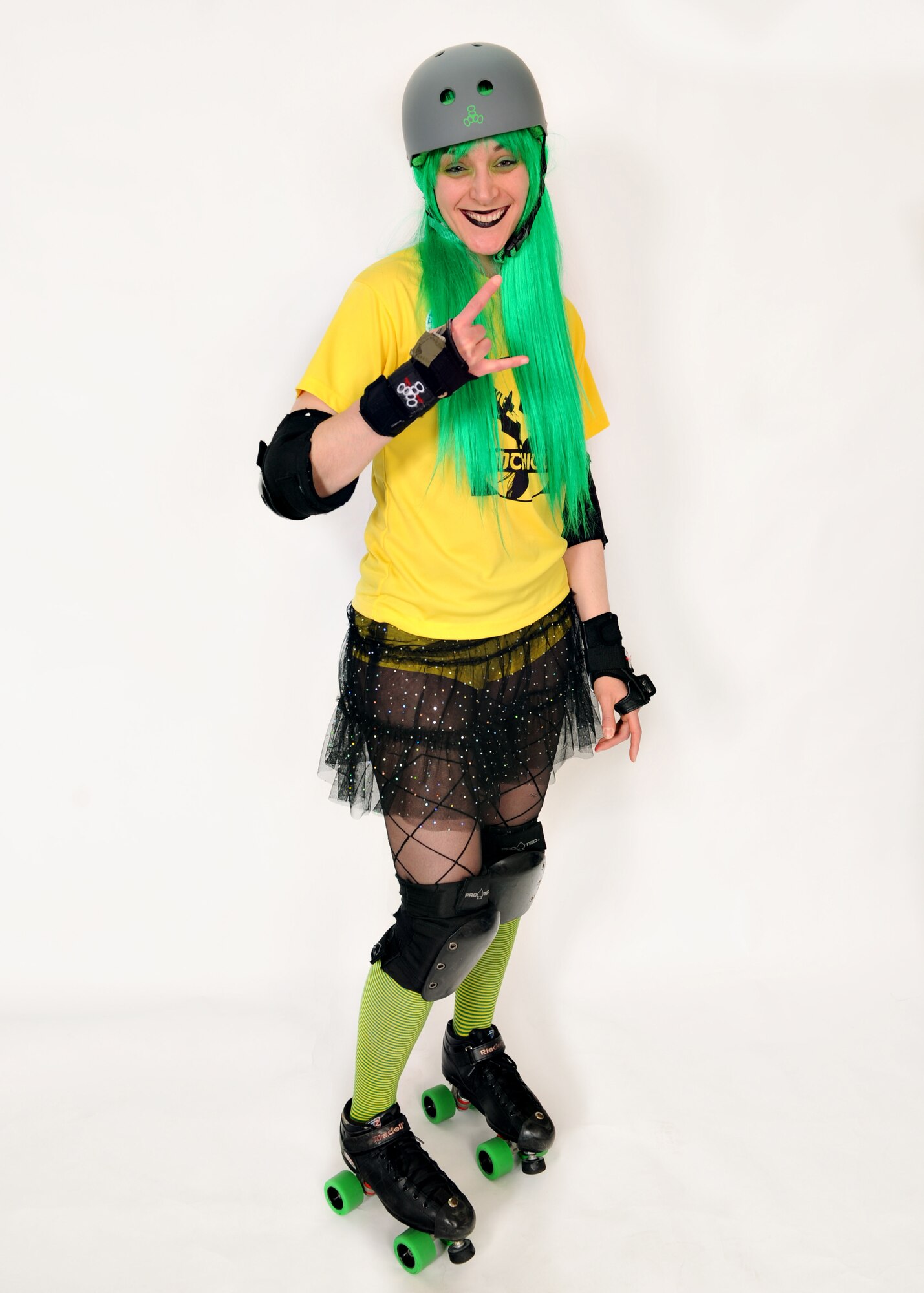 McPain, also known as Master Sgt. Jessica McWain, 51st Comptrollers Squadron and Wing Staff Agencies first sergeant, poses for a photo at Osan Air Base, Republic of Korea, March 18, 2014. McPain is one of many active military members on the KimChicks roller derby team. (U.S. Air Force photo/Senior Airman Siuta B. Ika)