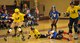 Members of the KimChicks and Rokettes roller derby teams engage each other during a bout at U.S. Army Garrison Humphreys, Republic of Korea, March 8, 2014. Both teams are primarily made up of active duty military members and spouses from Osan and Humphreys, who compete during monthly bouts. (U.S. Air Force photo/Senior Airman Siuta B. Ika)