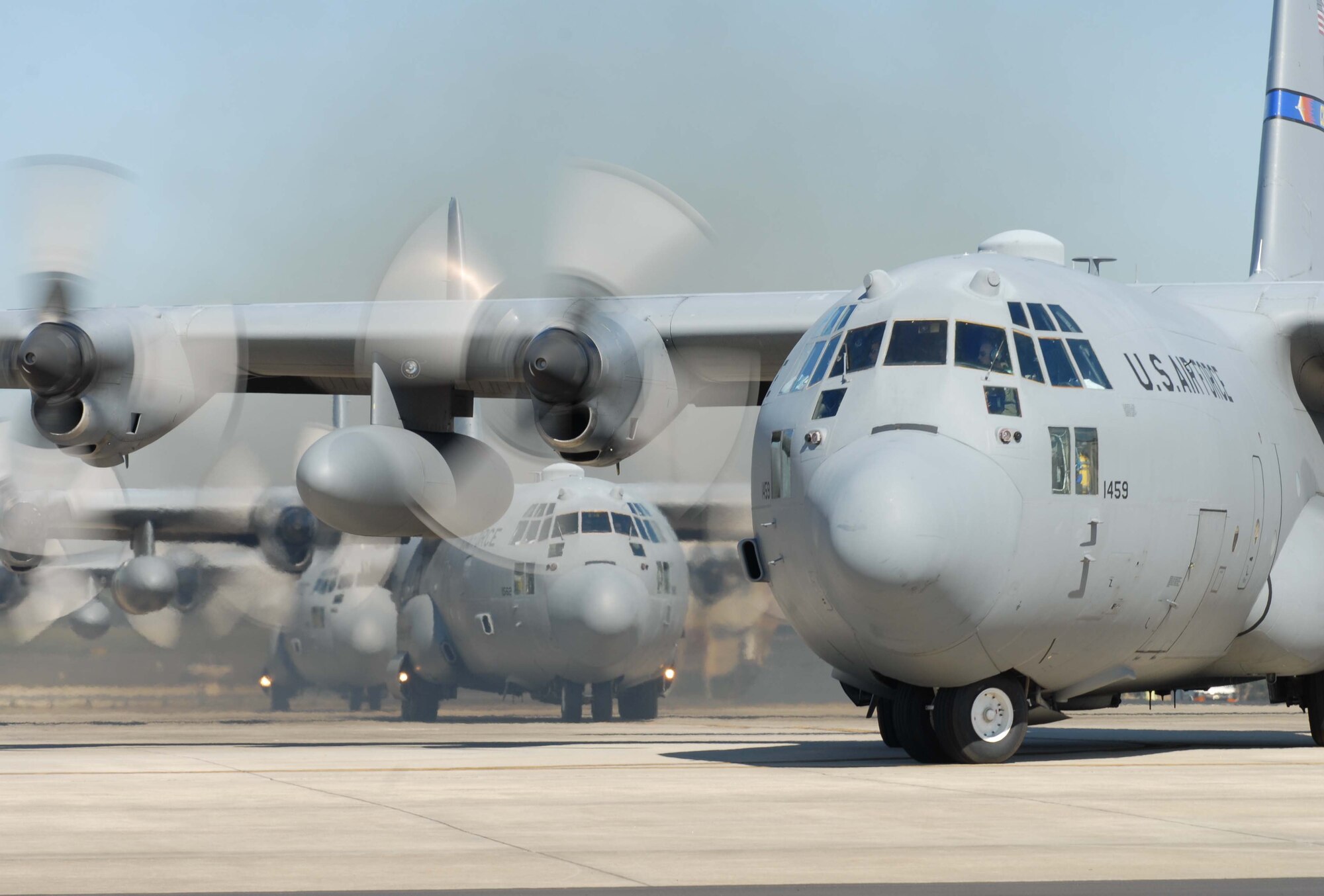 Aircrew from the North Carolina Air National Guard prepare for take-off as they demonstrate a six-ship formation on board C-130 Hercules aircraft during a generation exercise at the North Carolina Air National Guard base, Charlotte Douglas Intl. Airport, Oct. 25, 2013. The purpose of the exercise is to ensure that the 145th Airlift Wing can prepare a flight and take off within minutes of being notified of a mission. (U.S. Air National Guard photo by Tech. Sgt. Richard Kerner, 145th Public Affairs/Released)