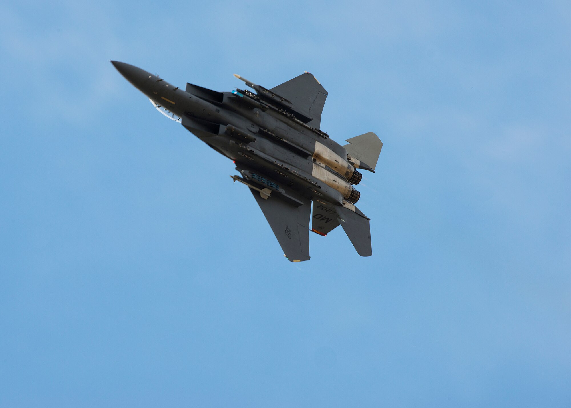 A 389th Fighter Squadron F-15E Strike Eagle maneuvers into a defensive position after conducting a show of force at Gunfighter Flag 14-2 exercise, at Saylor Creek bombing range near Mountain Air Force Base, Idaho, March 13, 2014. The exercise provided integrated and proficient joint forces training. (U.S. Air Force photo by Tech Sgt. JT May III/RELEASED)