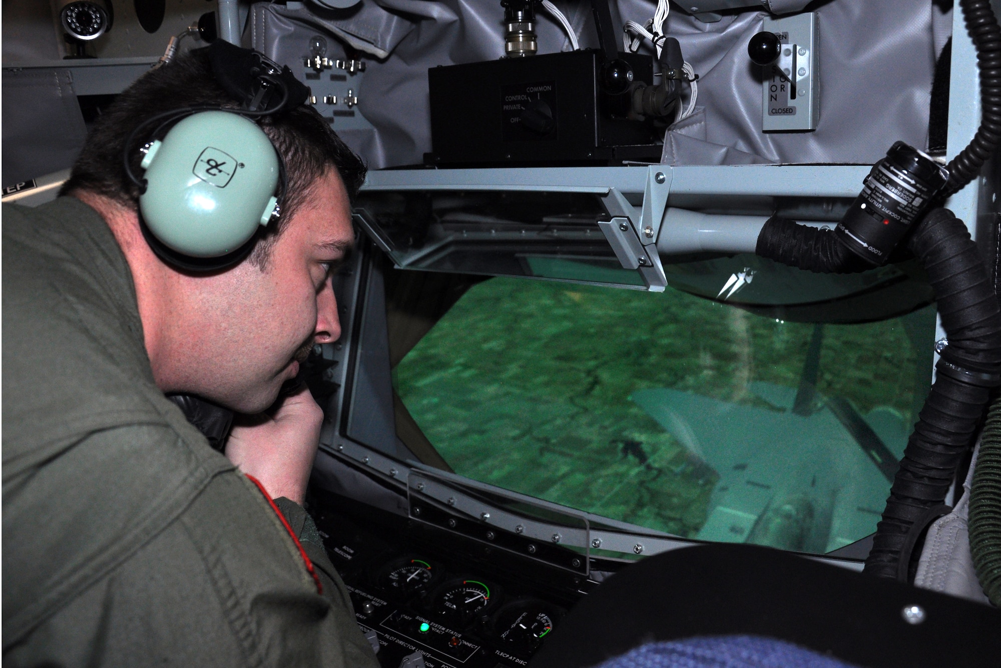 TSgt. Bruce Berglund, 911th Air Refueling Squadron boom operator, prepares to use the new boom operator weapons system trainer at Seymour Johnson Air Force Base, N.C., February 2014. (U.S. Air Force photo by Staff Sgt. Alan Abernethy, 916th ARW/PA)