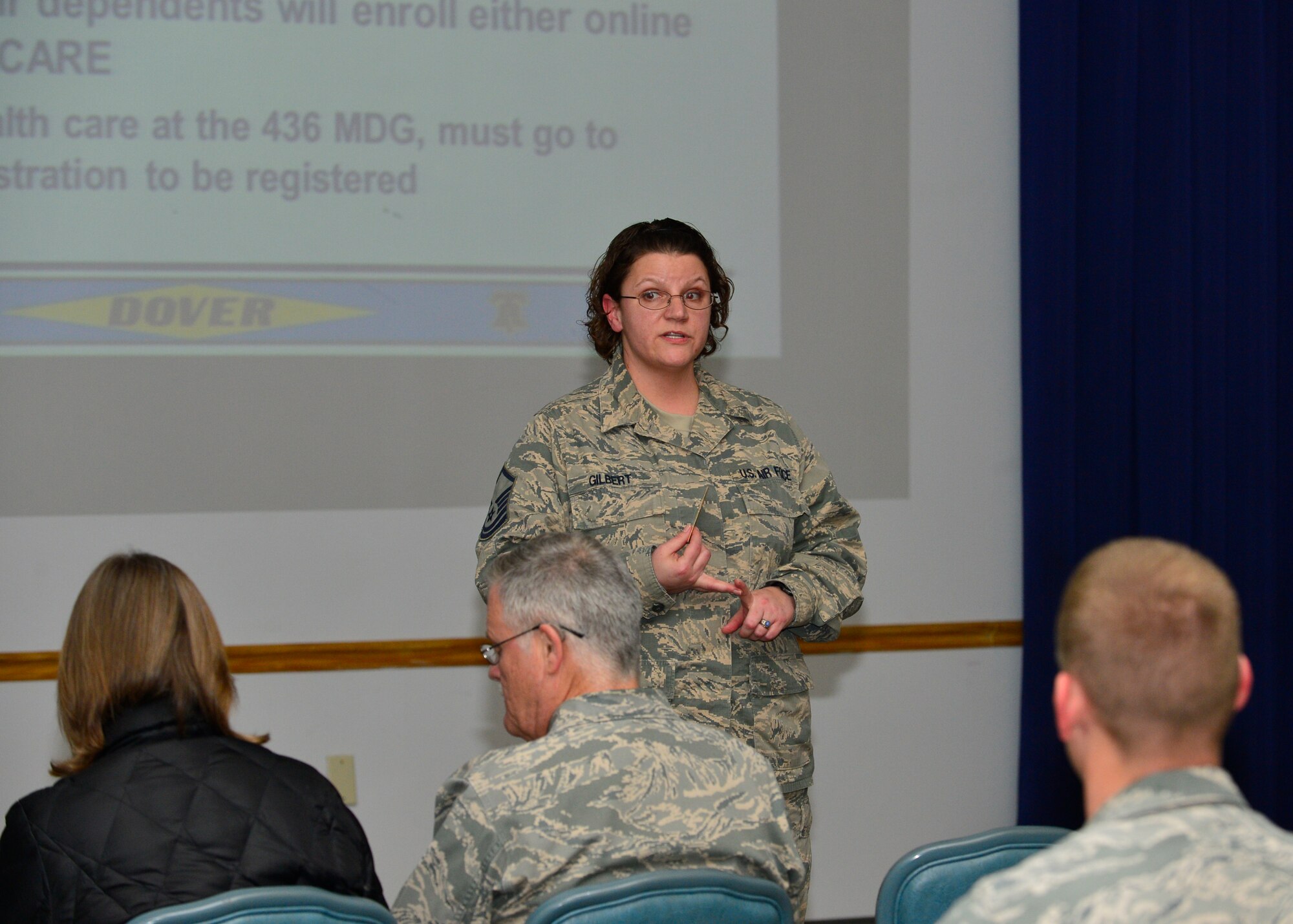 Master Sgt. Celia Gilbert, 436th Tricare Operations and Patient Administrations flight chief, speaks about enrollment changes to Tricare March 19, 2014, at The Landings on Dover Air Force Base, Del. Tricare will be closing down their service centers April 1, 2014, as part of a cost-cutting initiative of the Defense Health Agency. (U.S. Air Force Photo/Airman 1st Class William Johnson)