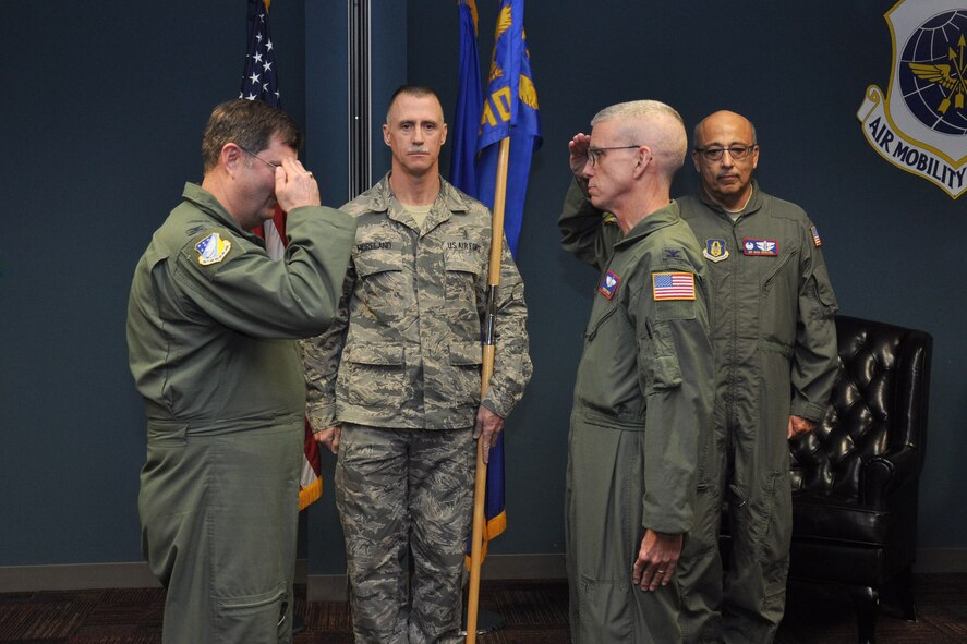 Col. Stephen Irvin salutes Col. Gregory Gilmour, 916th Air Refueling Wing commander, during a 916th Aerospace Medicine Squadron change of command ceremony, February 2014. Irvin replaced Col. Eduardo San Miguel as AMDS commander. (U.S. Air Force photo by Staff Sgt. Alan Abernethy, 916th ARW/PA)