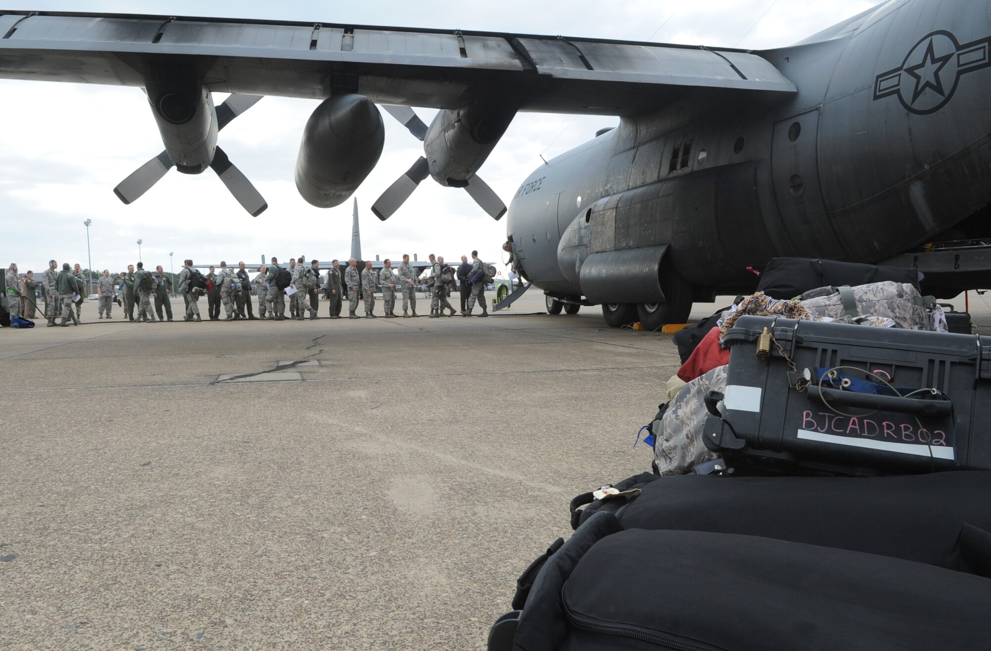More than 40 Team Little Rock members returned from a deployment March 14, 2014, at Little Rock Air Force Base, Ark. The members were met by wing, group and squadron leaders as they departed the aircraft. (U.S. Air Force photo by Staff Sgt. Caleb Pierce)  