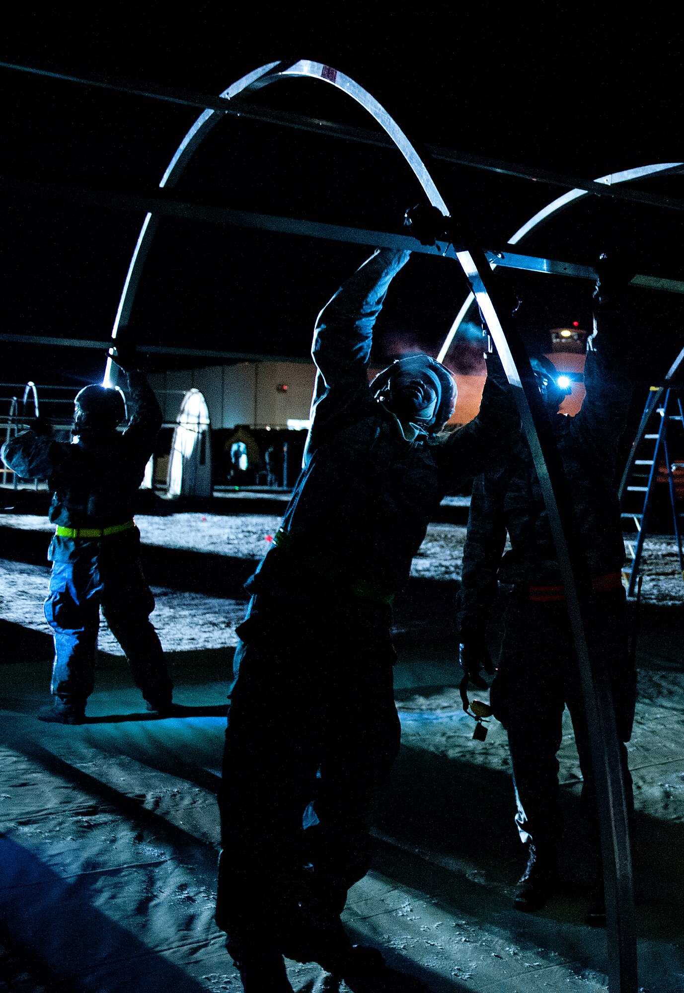 JOINT BASE MCGUIRE-DIX-LAKEHURST, N.J. -- Members of the 621st Contingency Response Wing establish a campsite while simultaneously beginning mobility operations during Exercise EAGLE FLAG 14-1, here March 2 to 8, 2014.  Exercise EF is a U.S. Air Force Expeditionary Center hosted exercise used to execute and evaluate mobility operations and expeditionary combat support.  (U.S. Air Force photo by TSgt. Matthew Hannen)