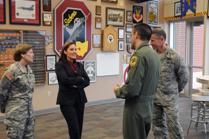 Ohio Lt. Gov. Mary Taylor visits the 178th Fighter Wing, Springfield Air National Guard Base, Ohio March 19 to learn about the wing's new missions and share the state proposal to allow veterans returning home more opportunities earning college credit.
Col. Greg Schnulo, 178th Fighter Wing Commander, (far right) and Col. Bryan Davis, 178th Reconnaissance Group Commander, (right) explain the wing's new missions along with Maj. Gen. Deborah Ashenhurst, Ohio adjutant general (left).(Ohio Air National Guard photo by Senior Master Sgt. Joseph Stahl/Relesed)