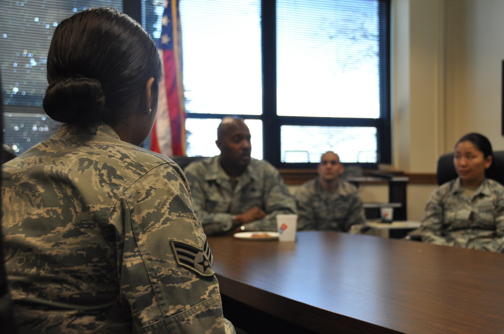 The 459th Air Refueling Wing’s Rising Six council, enlisted Airmen ranking E-1 to E-6, receive insight from Command Chief Master Sergeant Cameron B. Kirksey, Air Force Reserve Command, Robins Air Force Base, Ga, during a lunch at Joint Base Andrews, Md.,  March 14, 2014. Kirksey spent the day with members of the 459 ARW to gain first-hand insight on daily operations throughout the wing. (U.S. Air Force photo/ Staff Sgt. Amber Russell)