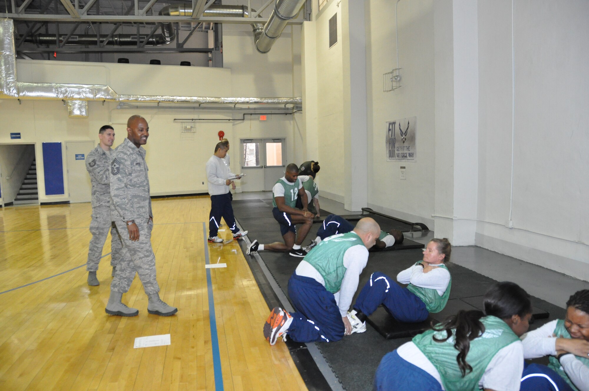 Command Chief Master Sergeant Cameron B. Kirksey, Air Force Reserve Command, Robins Air Force Base, Ga., observes fitness testing at the East Fitness Center, Joint Base Andrews, Md.,  March 15, 2014. Kirksey spent the day with members of the 459th Air Refueling Wing to gain first-hand insight on daily operations throughout the wing. (U.S. Air Force photo/ Staff Sgt. Amber Russell)