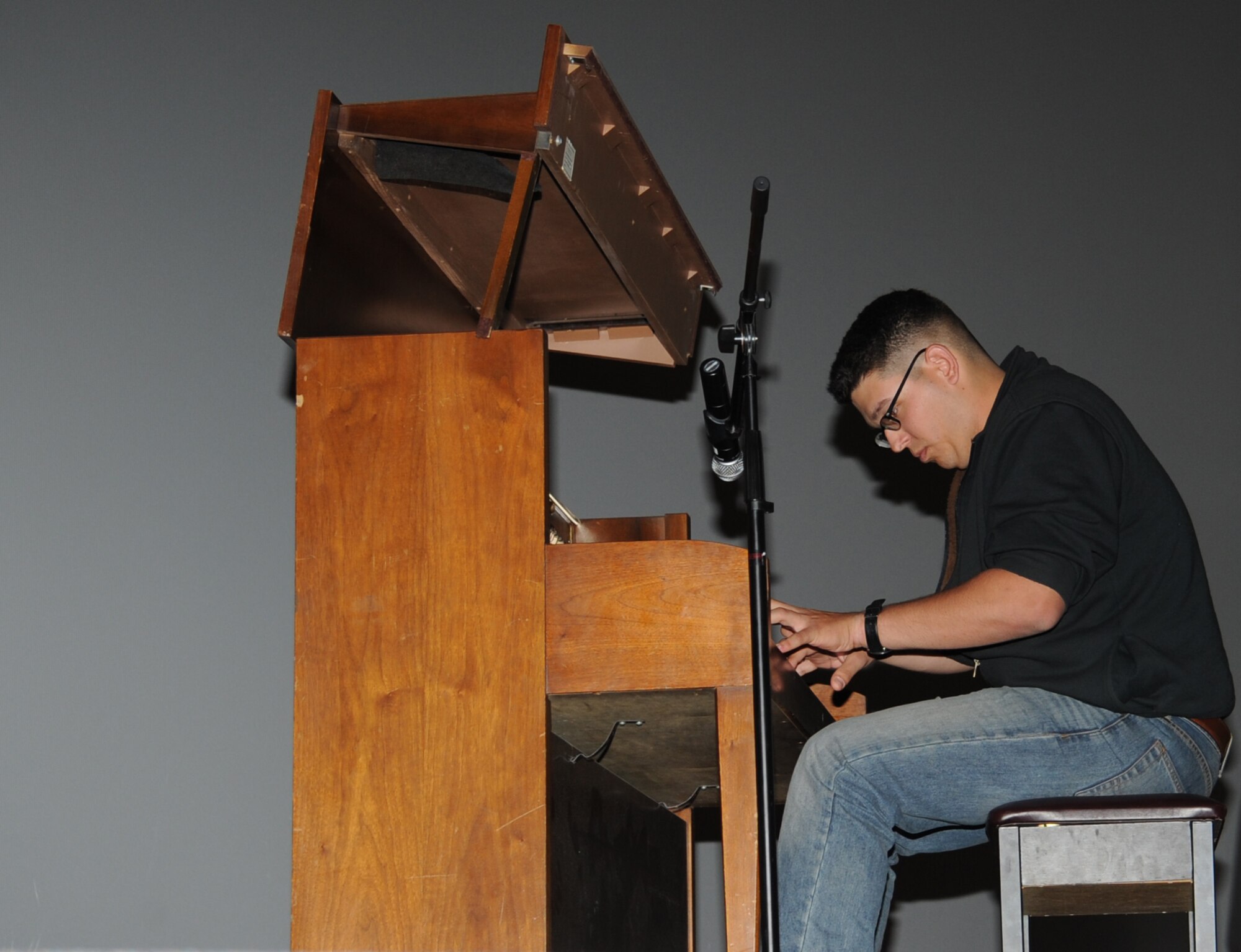 GOODFELLOW AIR FORCE BASE, Texas -- Marine Corps Pfc. Harrison Soape, Marine Corps Detachment student, plays a song he wrote on the piano during the Student’s Got Talent competition at the Base Theater here March 11. Baxter won second place in the competition. (U.S. Air Force photo/ Staff Sgt. Laura R. McFarlane)