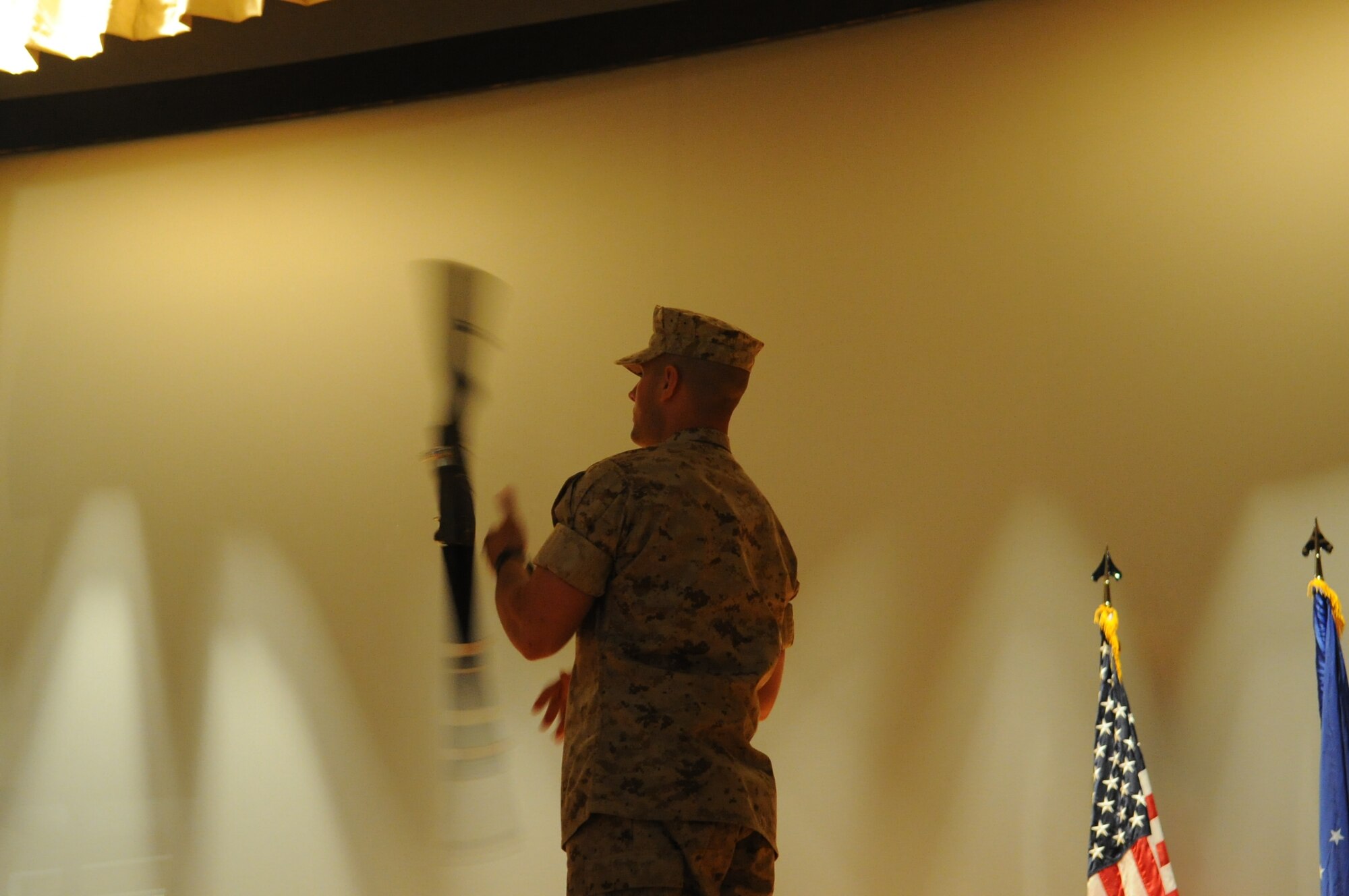 GOODFELLOW AIR FORCE BASE, Texas -- Marine Corps Pfc. Roman Fiol, Marine Corps Detachment student, performs a rifle drill during the Student’s Got Talent competition at the Base Theater here March 11. The contest was an opportunity for the students to show their talents outside of the classroom. (U.S. Air Force photo/ Staff Sgt. Laura R. McFarlane)
