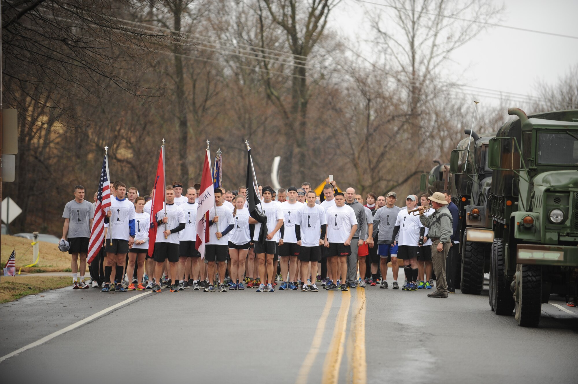 Arkansas Run for the Fallen runners prepare to start the 5K portion of the ARFF March 16, 2014, at Little Rock, Ark. The run concluded at the state Capitol with a guest speaker, thankful remarks from Chief Master Sgt. Bubba Beason, 19th Logistic Readiness Squadron fabrications flight chief,  a word from a gold-star mother, the reading of the 133 names of the fallen Arkansans, and finished with a 21-gun salute performed by Little Rock Air Force Base’s honor guard. (U.S. Air Force photo by Airman 1st Class Cliffton Dolezal)