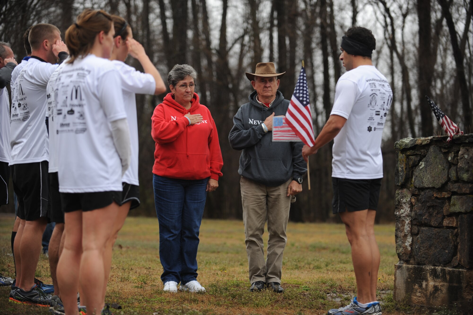 Gold-star parents of a fallen Arkansan watch as their son’s biography is read to the runners March 16, 2014, at Little Rock, Ark. A gold-star mother is the mother of a fallen service member, whereas a blue-star mother is the mother of a service member who’s still actively serving. (U.S. Air Force photo by Airman 1st Class Cliffton Dolezal)