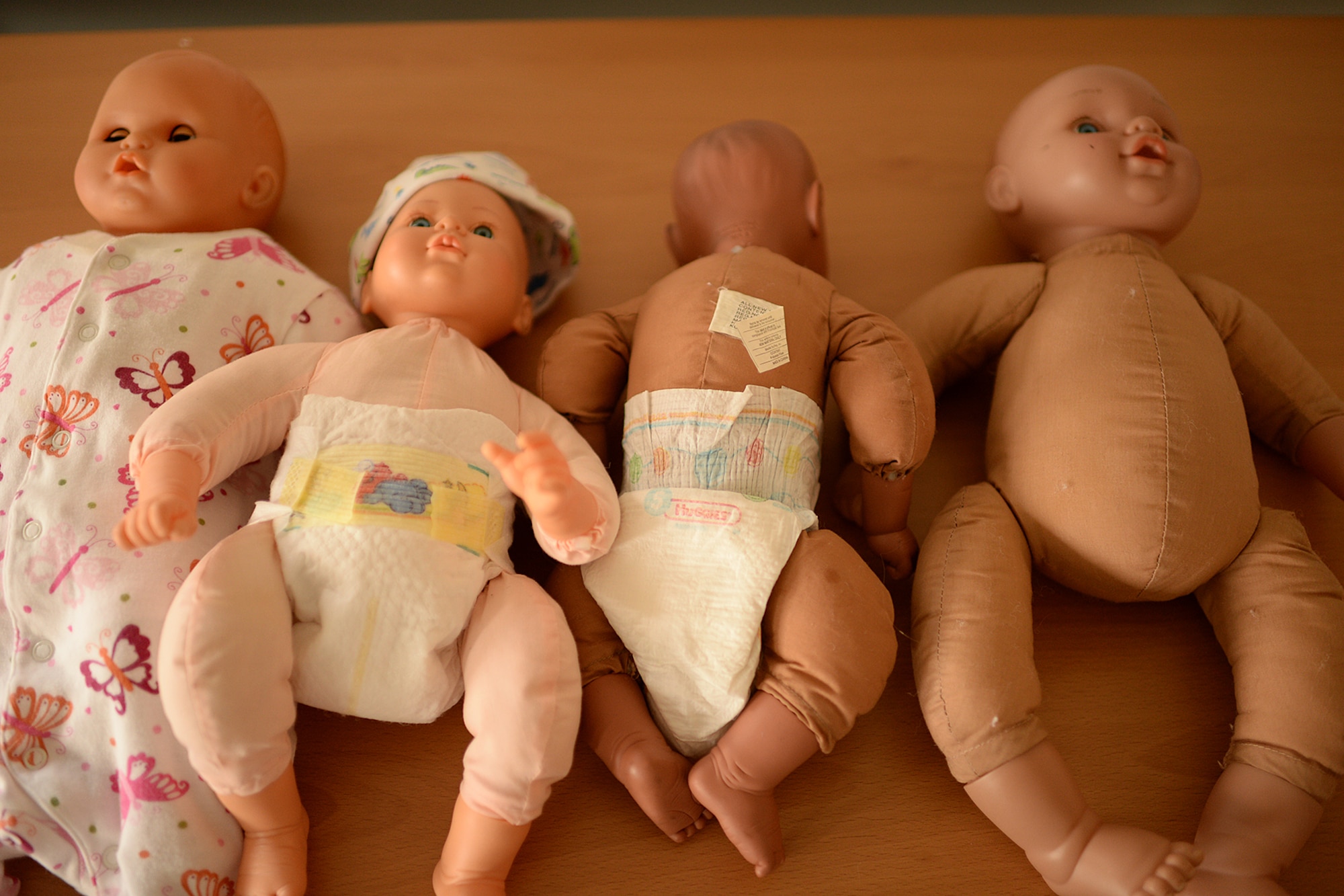 Dolls rest on a table during a Babies 201 class at Spangdahlem Air Base, Germany, March 19, 2014. Babies 201 is an advanced level of parent education taught by the 52nd Medical Operations Squadron Family Advocacy's New Parent Support Program. Trained nurses and staff run these courses throughout the year, with Babies 201 offered once a month. (U.S. Air Force photo by Staff Sgt. Daryl Knee/Released)