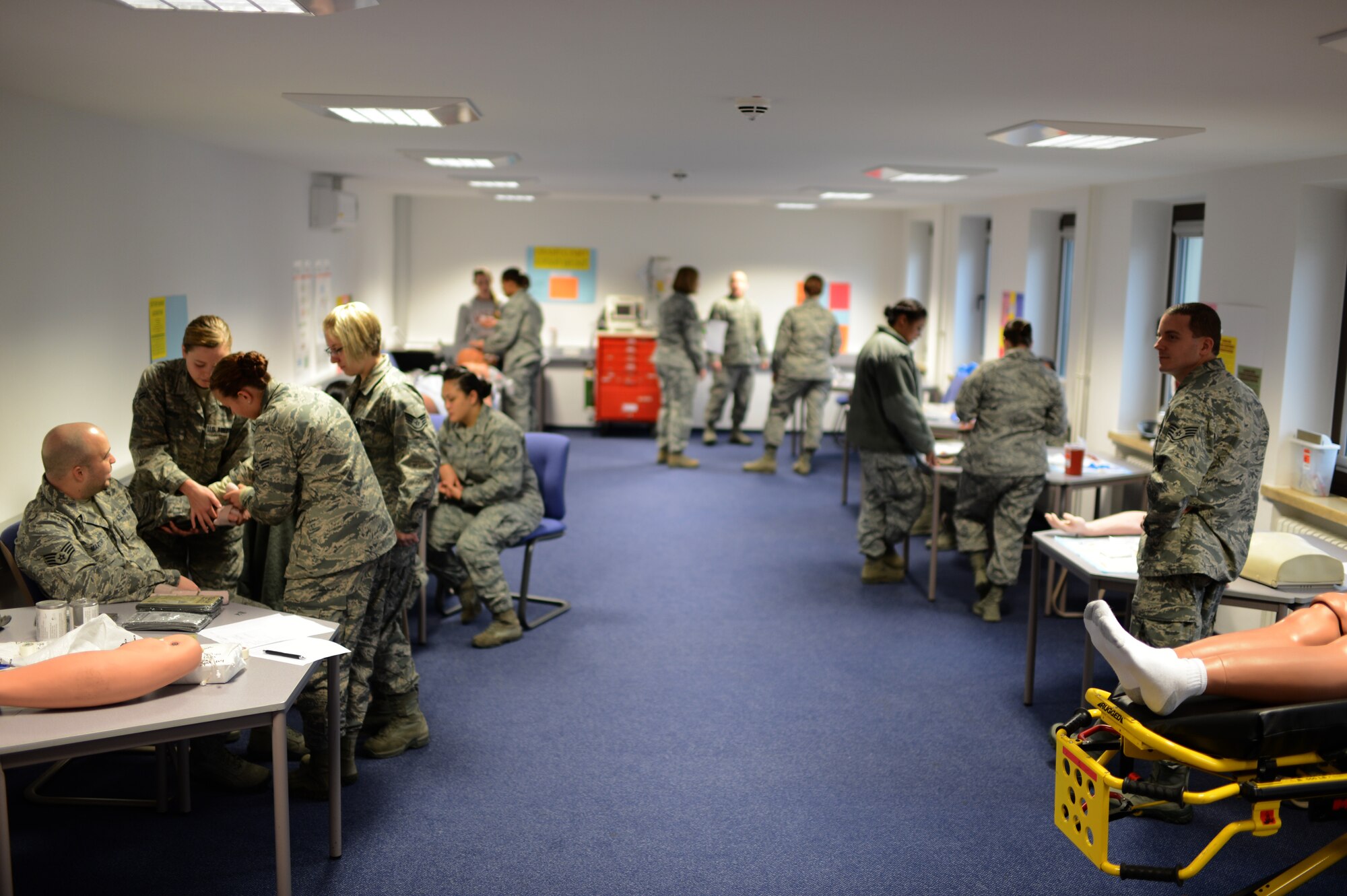 Airmen from the 52nd Medical Operations Squadron participate in a skills training class at Spangdahlem Air Base, Germany, March 19, 2014. The training occurs quarterly to ensure medical technicians are up-to-date on their skills needed for job competency. (U.S. Air Force photo by Senior Airman Gustavo Castillo/Released)