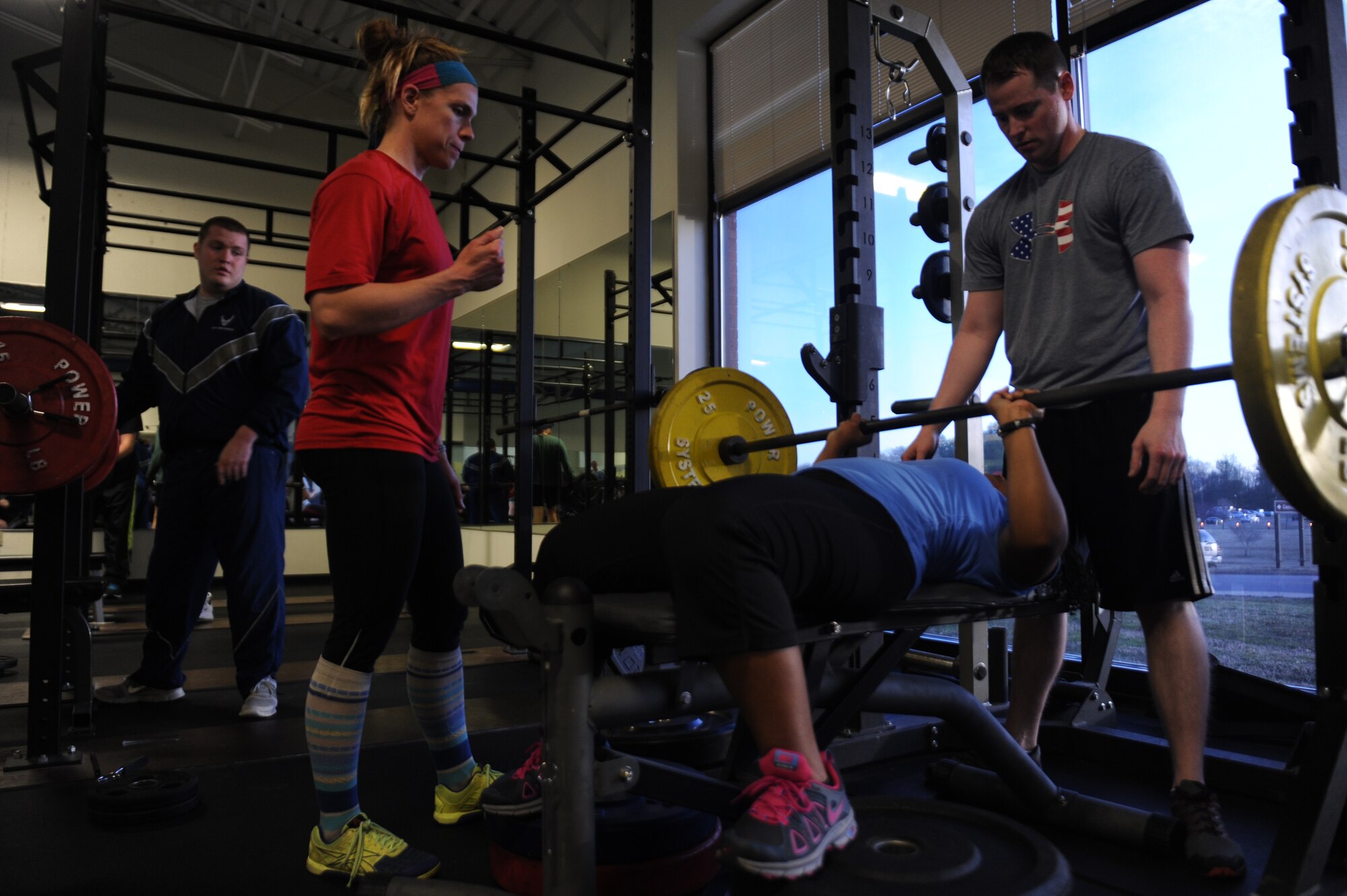 Lindsay Burks, a 19th Aerospace Medicine Squadron health and fitness specialist, teaches a Vital 90 class March 19, 2014, at Little Rock Air Force Base’s gym. Burks instructs six Vital 90 classes per week helping Airmen improve their fitness levels. During Wingman Day, Burks led two healthy living classes and assisted with six fitness sessions aimed at developing the physical domain for 500 Airmen. (U.S. Air Force photo by Airman 1st Class Cliffton Dolezal)