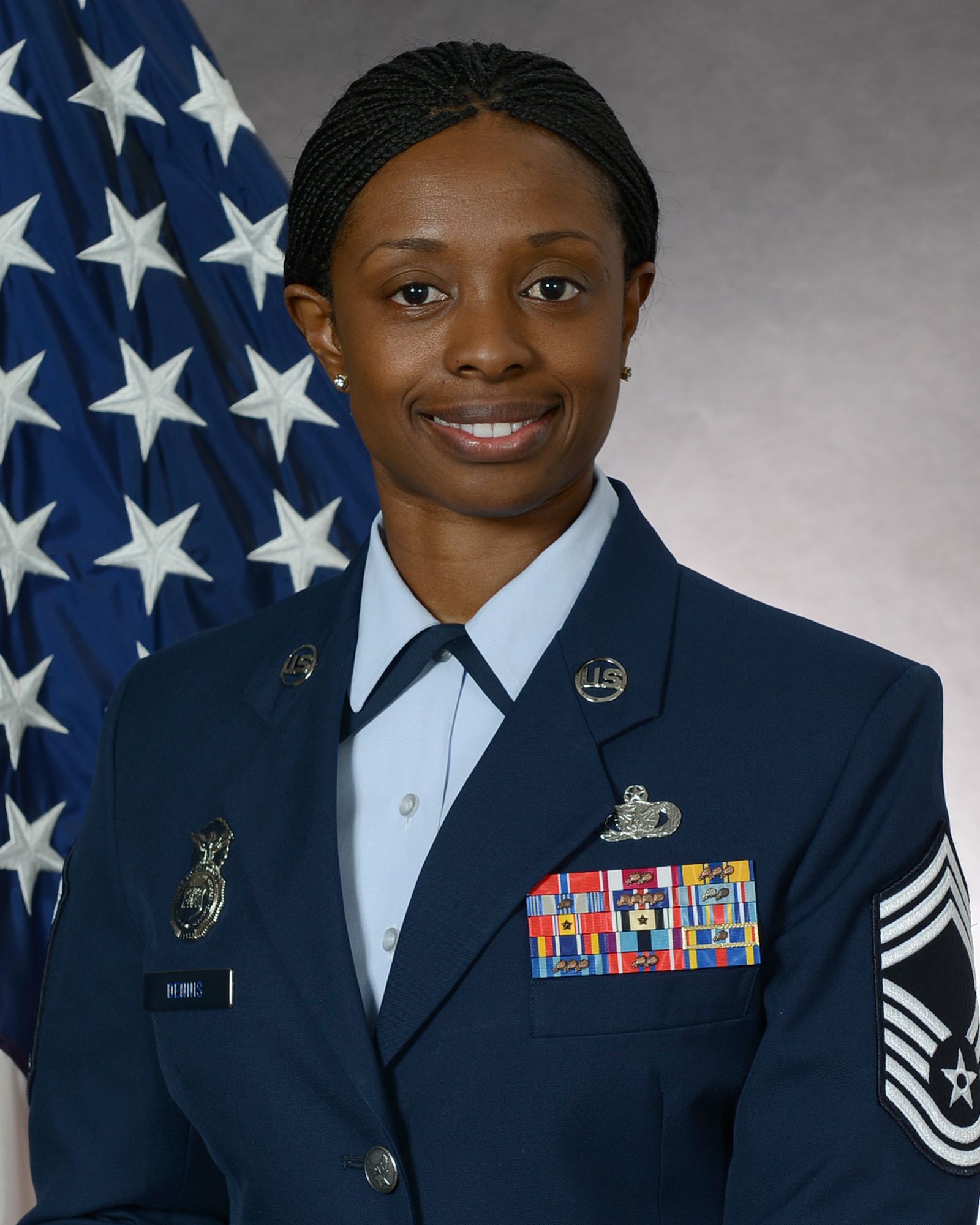 Chief Master Sgt. Tamar Dennis, 51st Security Forces Squadron manager, represents one of Osan Air Base's inspiring women. March is Women's History Month with the theme "Celebrating Women of Character, Courage and Commitment." (Courtesy photo)