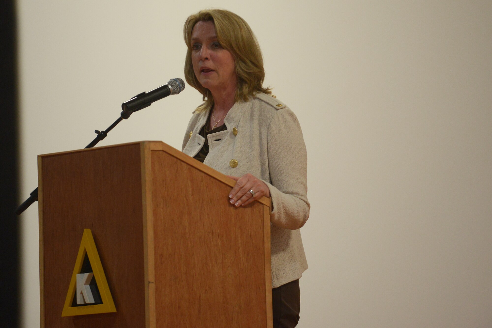 Secretary of the Air Force Deborah Lee James speaks with Airmen from the 379th Air Expeditionary Wing and the Combined Air Operations Center during an all call at Al Udeid Air Base, Qatar, Mar. 18, 2014.  During the call, James spoke about her three priorities for the Air Force; taking care of people, balancing readiness of today with readiness of tomorrow and making every dollar count.  She also highlighted the Air Force Core Values, praising Airmen for living them personally but asking that they keep them a "team sport" as well.  (U.S. Air Force photo/Master Sgt. David Miller)