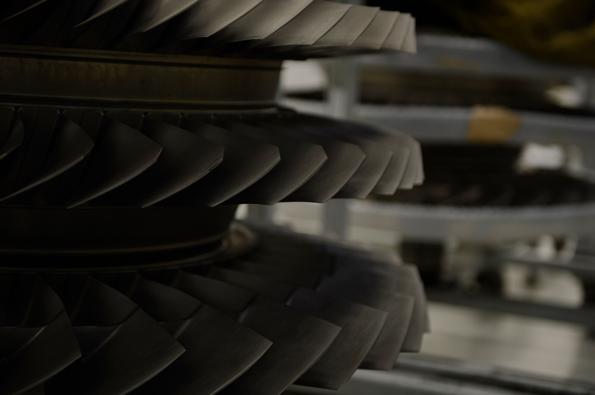 U.S. Air force F-16 Fighting Falcon fighter aircraft rotary blades are stacked in the 52nd Component Maintenance Squadron propulsion flight hangar March 18, 2014, at Spangdahlem Air Base, Germany. Newly received engines are fully inspected for damage before they are recertified for use on an aircraft.  (U.S. Air Force photo by Staff Sgt. Christopher Ruano/Released)