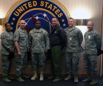 OFFUTT AFB, Neb. (March 20, 2014) Command Sgt. Maj. Patrick Alston, senior enlisted leader, U.S. Strategic Command recognizes USSTRATCOM Senior Master Sergeant selects Latisha Villahermosa, Ernest Owens, James Pearson, Michael Trunick and Nicholas Casella on their selection for promotion to the rank of Senior Master Sergeant.