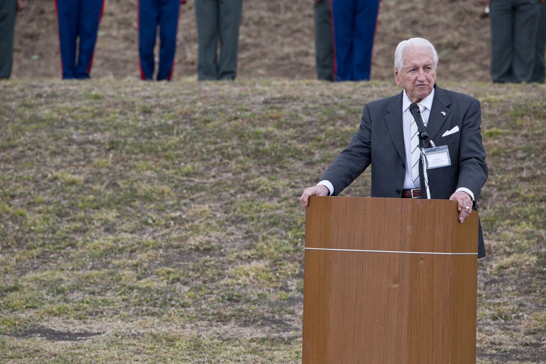 Kurt Tong, left, retired Marine Lt. Gen. Lawrence F. Snowden, center, and Gen. James F. Amos walk toward the Reunion of Honor memorial March 19 during the annual Reunion of Honor ceremony on Iwo To, formerly known as Iwo Jima. “We are here for the purpose of honoring and saluting the dead on both sides,” said Snowden, who founded the Reunion of Honor in 1995. The ceremony marked the 69th anniversary of the Battle of Iwo Jima. Tong is the deputy chief of mission for the U.S. Embassy in Japan, and Amos is commandant of the Marine Corps. 