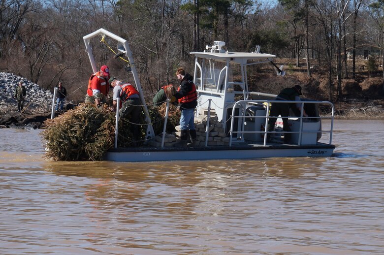 Arkabutla Lake recently hosted the 2014 fish habitat day. Twenty five volunteers gathered at the Arkabutla Lake Field Office to assist with the placement of fish structures in the lake bed.  These Volunteers donated more than 170 hours of their time and were served breakfast and lunch, donated by Superlo Foods in Southaven and Kroger in Hernando. Gifts and gift cards were donated by Sportsman’s Warehouse in Southaven and Walmart in Hernando.