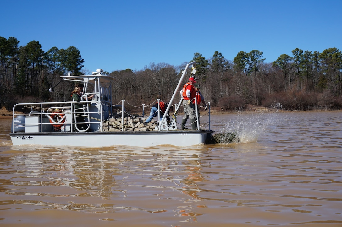 Arkabutla Lake recently hosted the 2014 fish habitat day. Twenty five volunteers gathered at the Arkabutla Lake Field Office to assist with the placement of fish structures in the lake bed.  These Volunteers donated more than 170 hours of their time and were served breakfast and lunch, donated by Superlo Foods in Southaven and Kroger in Hernando. Gifts and gift cards were donated by Sportsman’s Warehouse in Southaven and Walmart in Hernando.