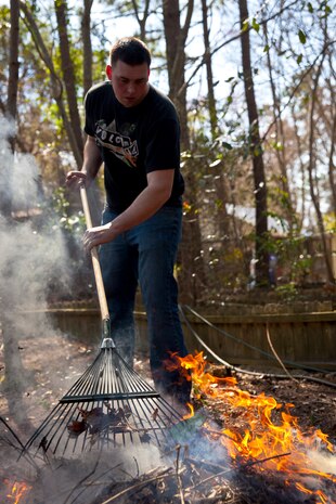 Cpl. Daniel Cubino, a Burlington, N.C., native and Marine with General Support Maintenance Company, 2nd Maintenance Battalion, 2nd Marine Logistics Group, clears brush at the Lynwood Park Zoo in Jacksonville, N.C., March 15, 2014. Thirty Marines with the company volunteered time during their weekend at several locations throughout the area as a way to give back to the community that surrounds Marine Corps Base Camp Lejeune, N.C.